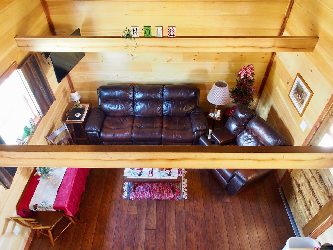 Living Room Area from Open Air Loft. Cabins Have Central Heat and Air Throughout