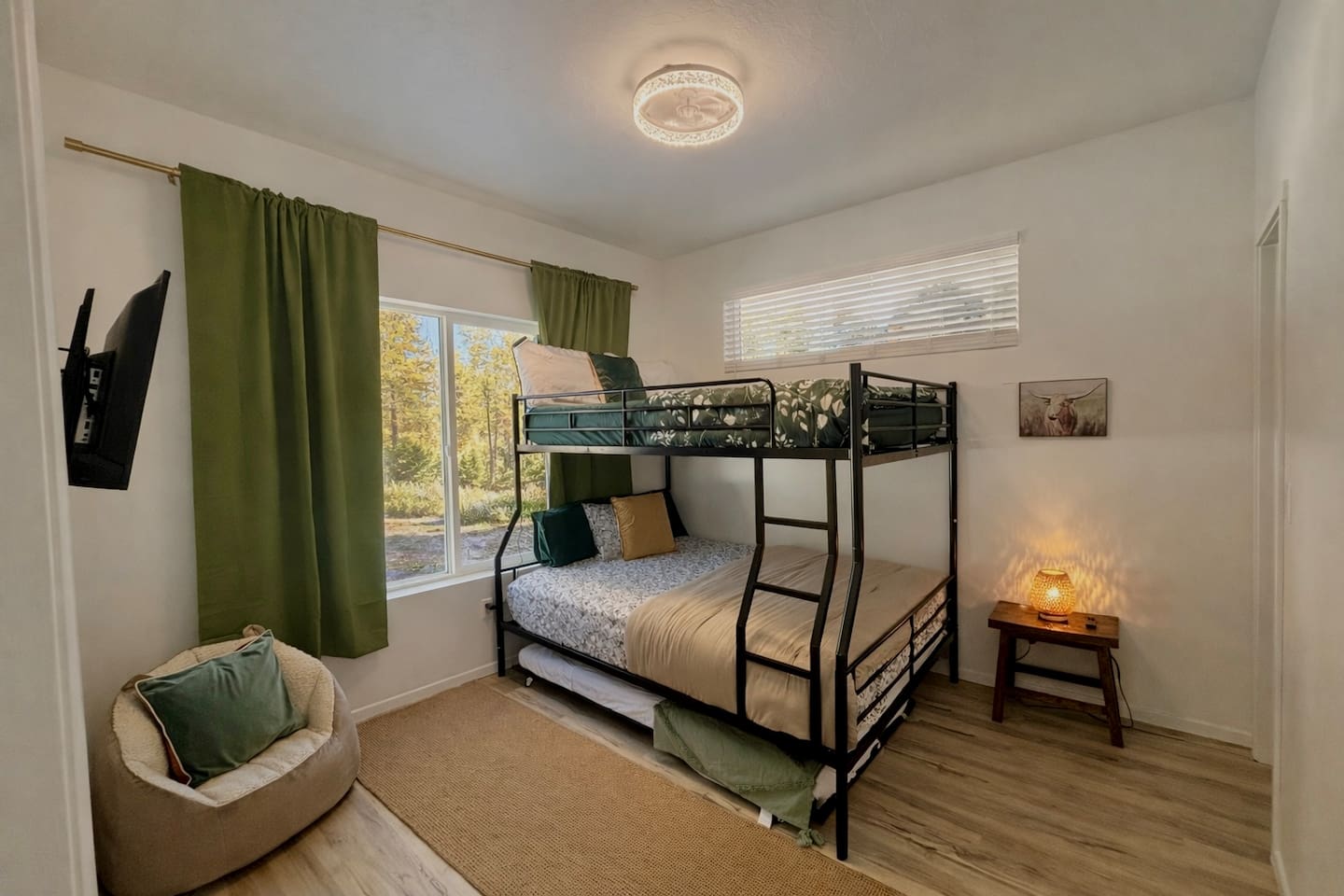 Cozy up in our Full XL over Queen bunk bend with additional twin size trundle bed. 