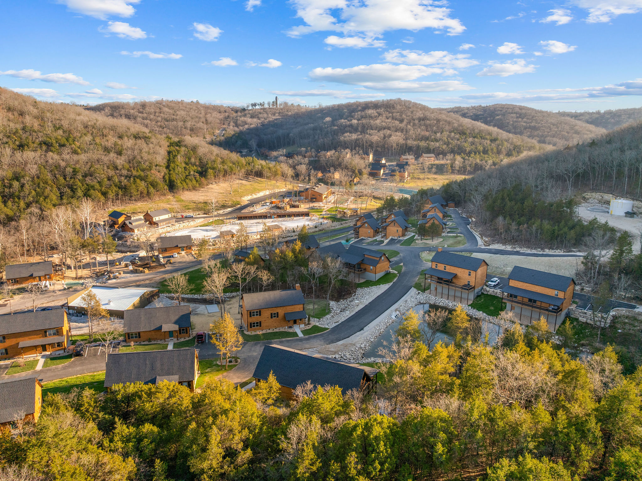 Scenic views across the valley and nearby cabins.