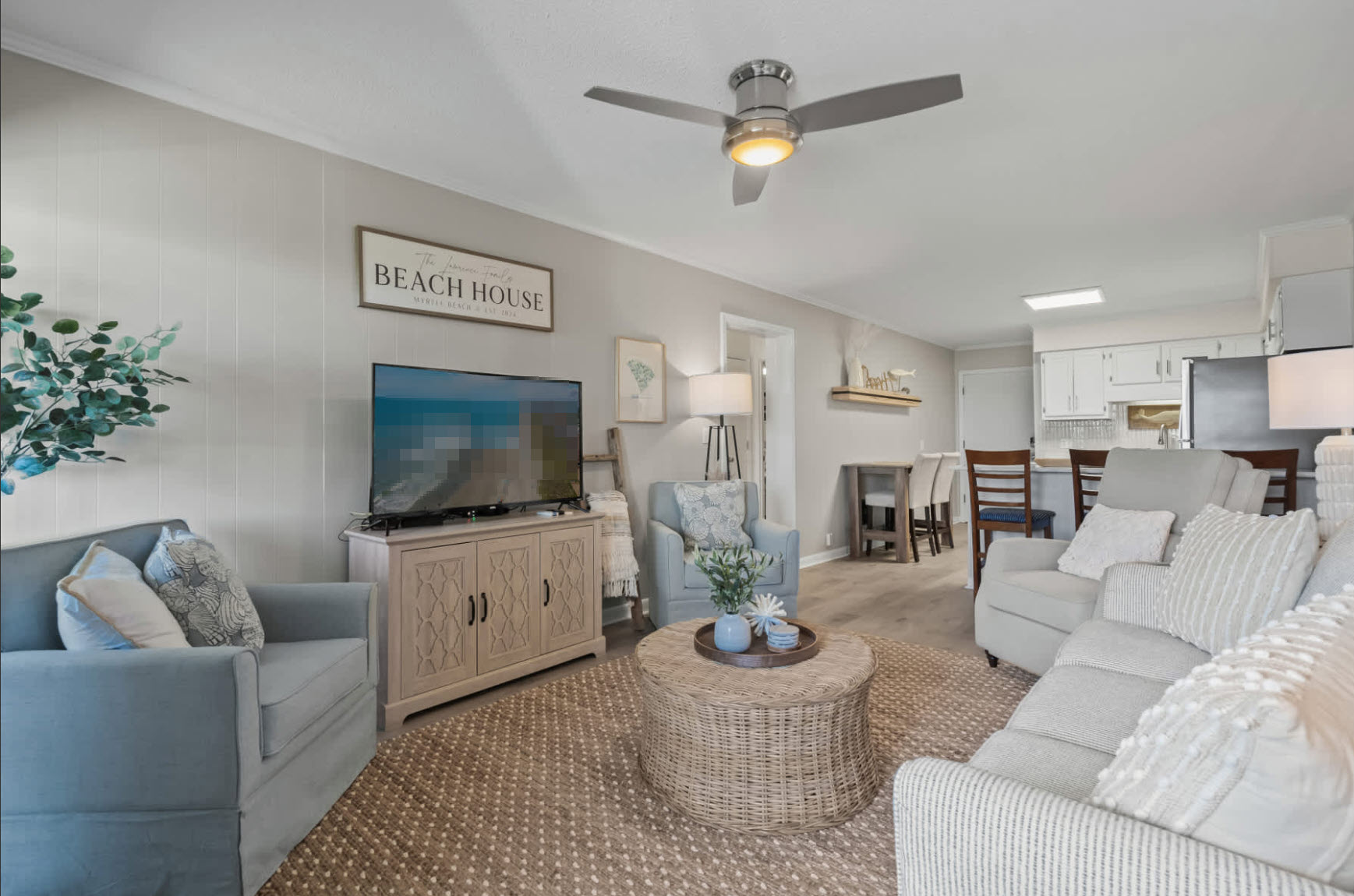 Flat Screen TV with Tons of Cozy Places to Relax