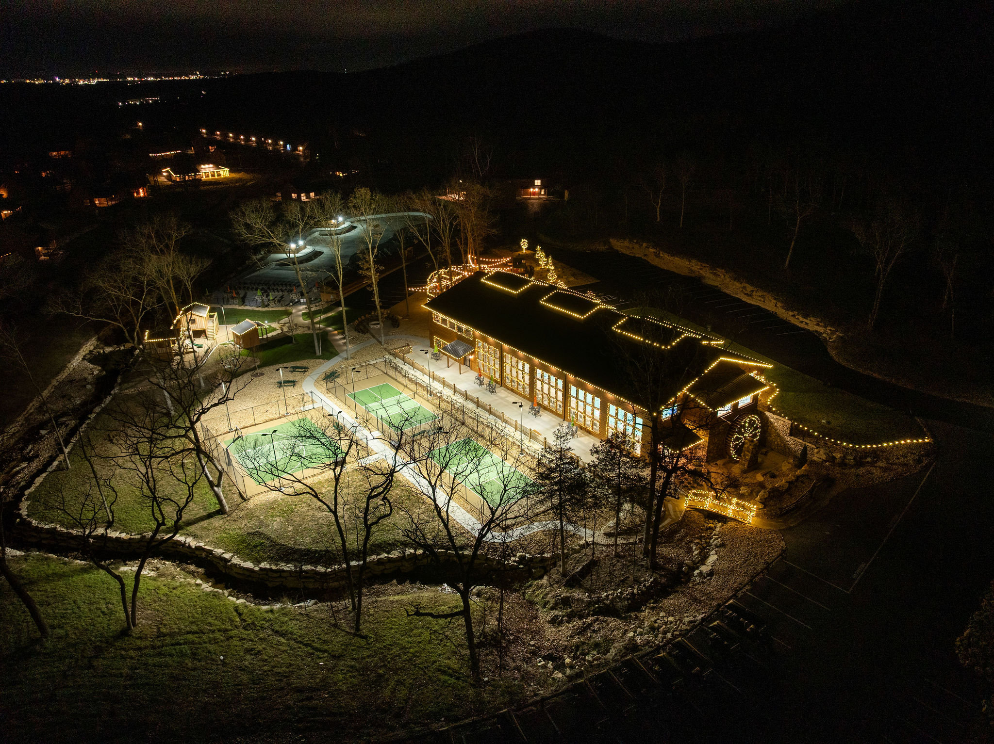 Evening aerial view showing the peaceful setting at night.
