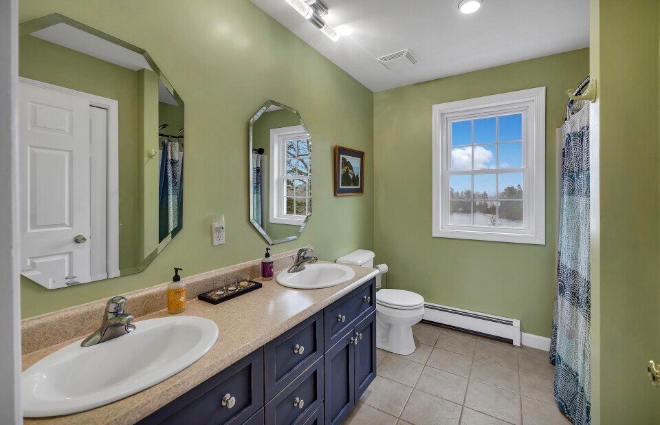 Full bath with double vanity on 2nd floor