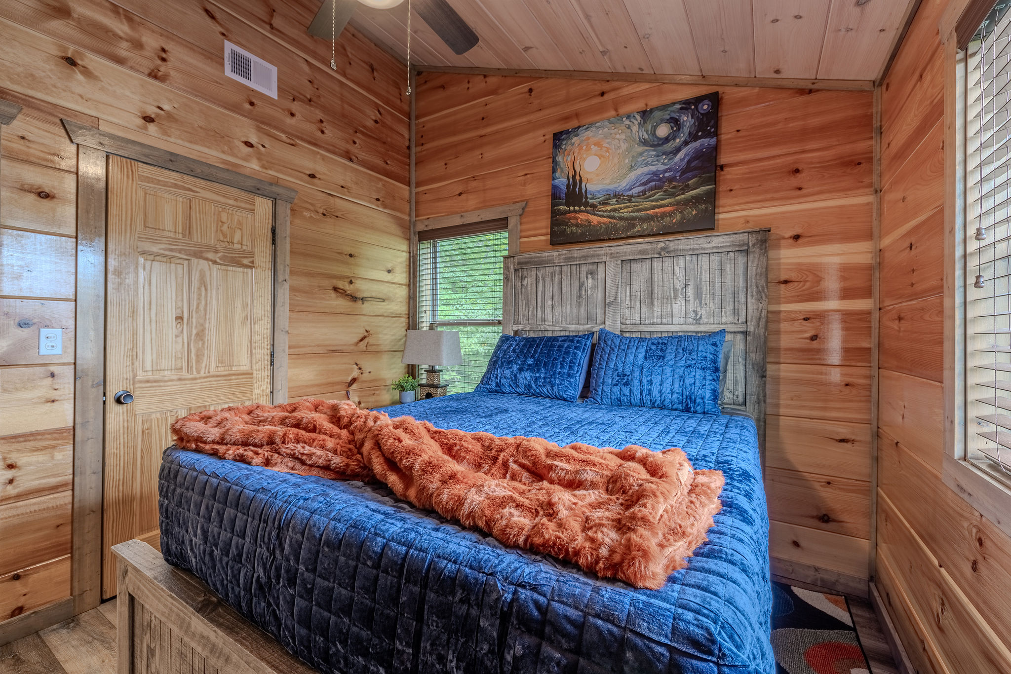 A second look at The Stargazer Suite, featuring a Smart TV, cozy cabin details, and a peaceful retreat-style atmosphere.
