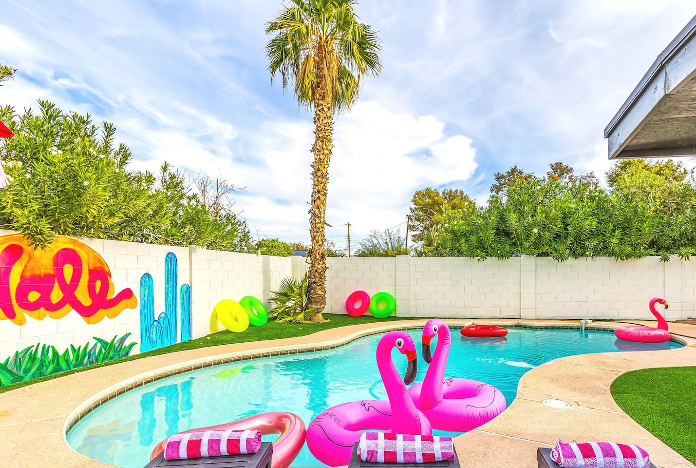Palm trees, pool floats, and perfect weather—your backyard oasis awaits in the heart of Scottsdale.

