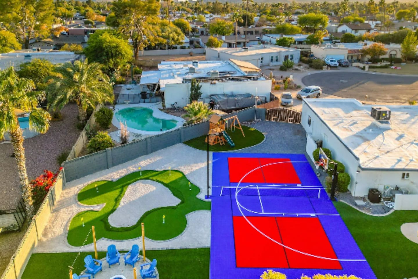 Late afternoon light hits the court just right — the kind of backyard that photographs as well as it plays.