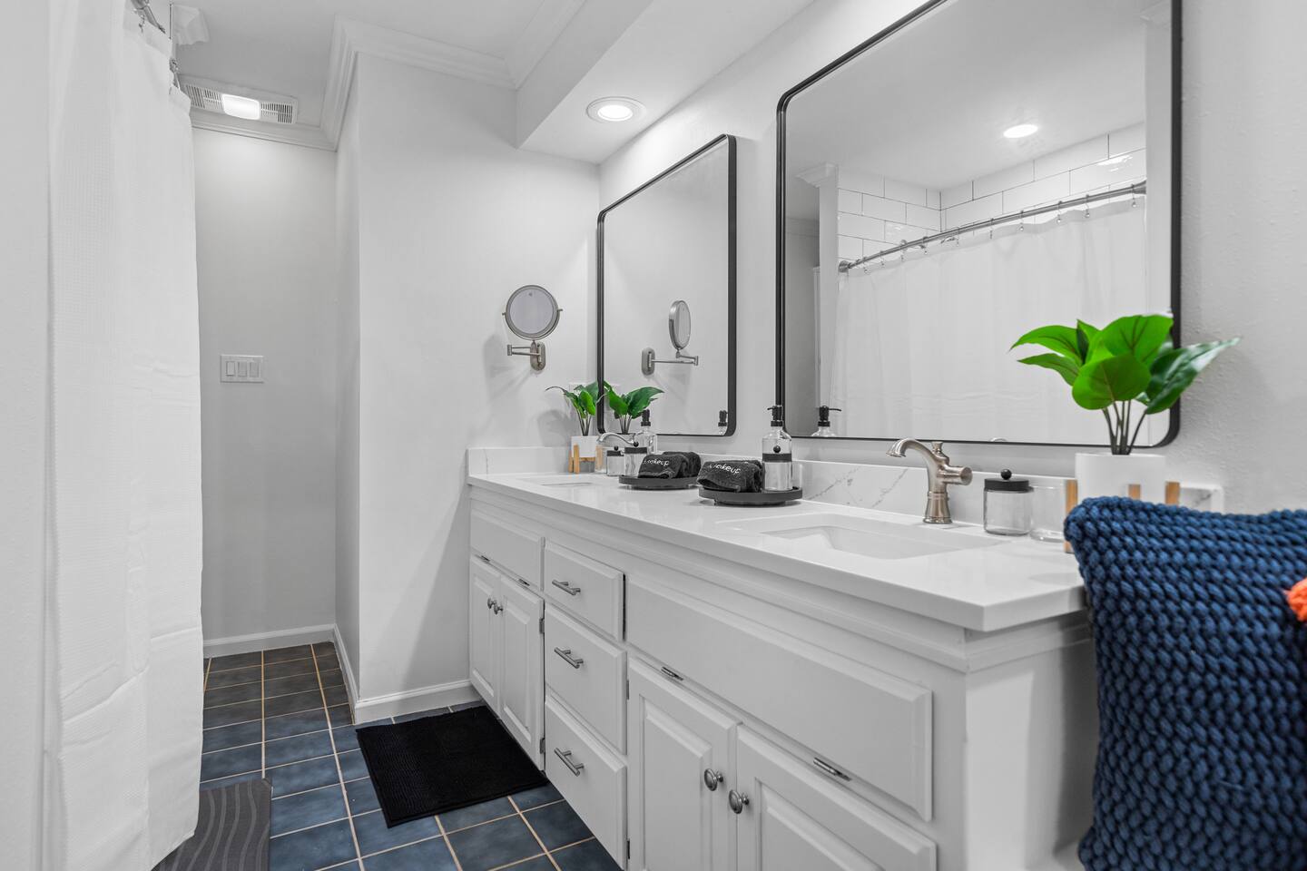 Enjoy Hues of Blue bringing in the Lake in this 2nd Ensuite off of the "Sunset" Room.