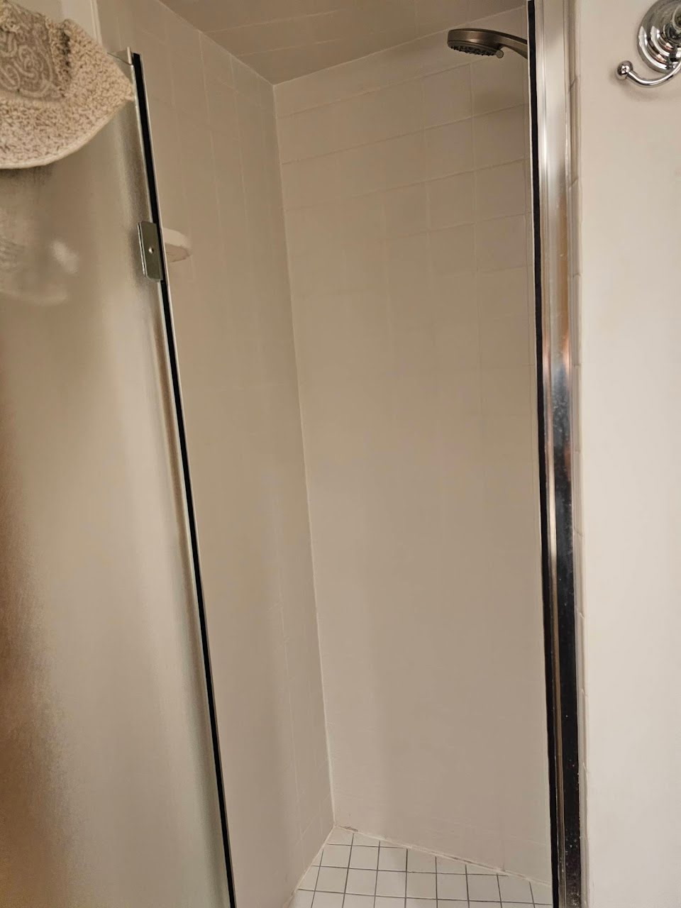 Bathroom with 2 sinks, shower, and toilet