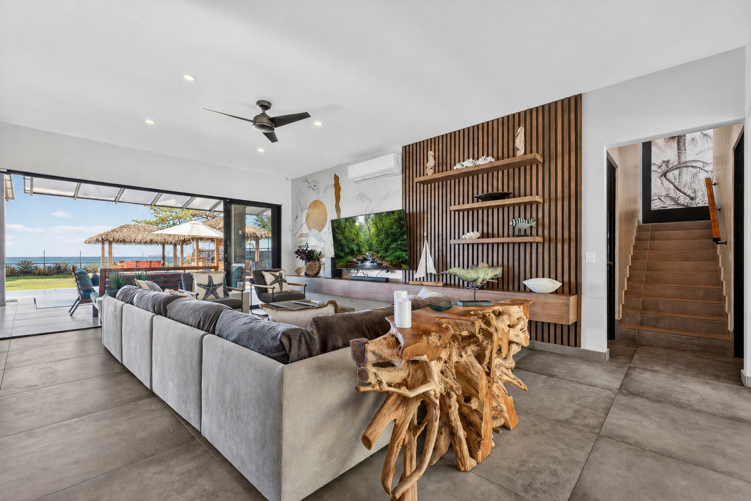 Great Room with sliding glass doors to the pool and backyard area. 