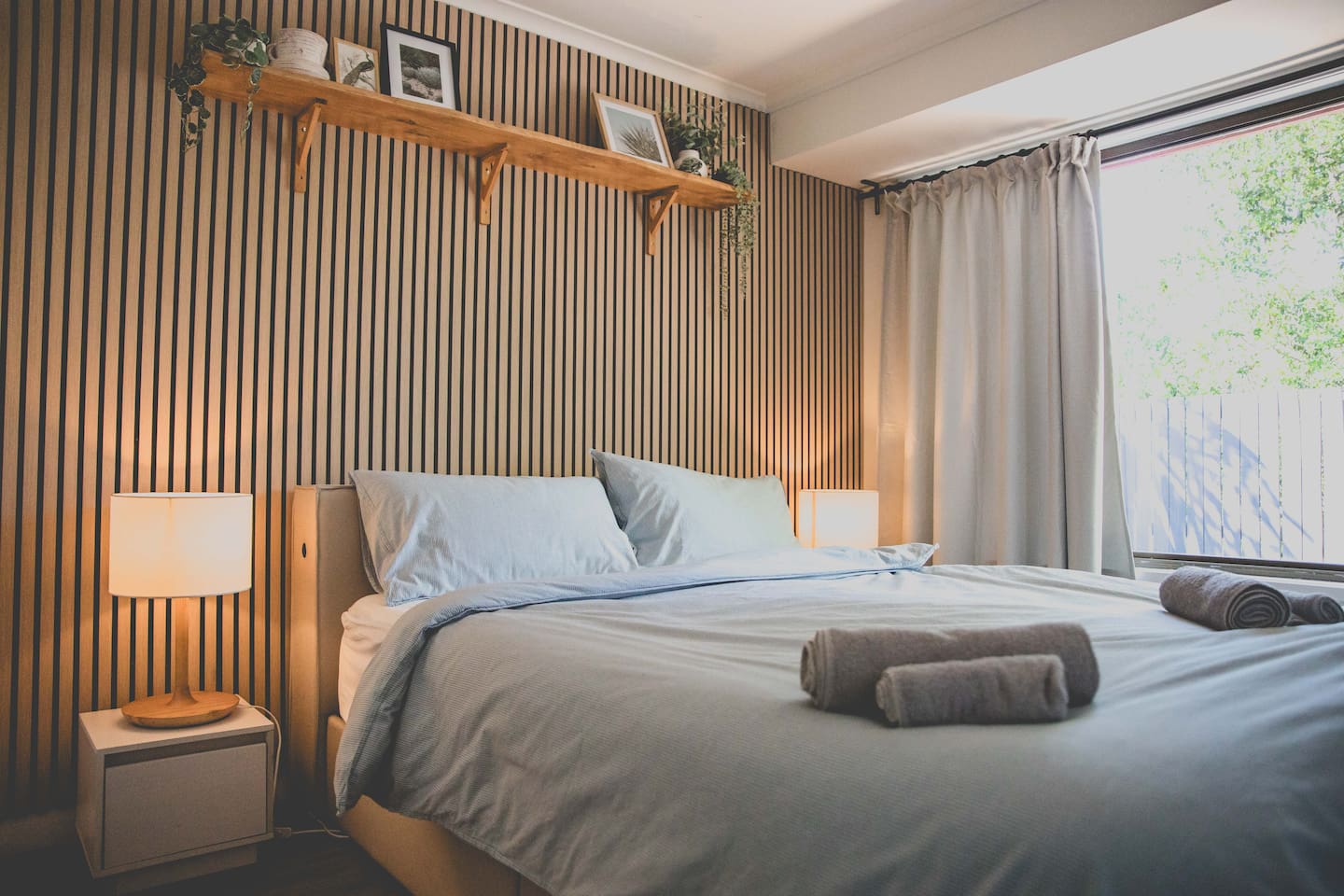 A queen bed with a nice comfy mattress.