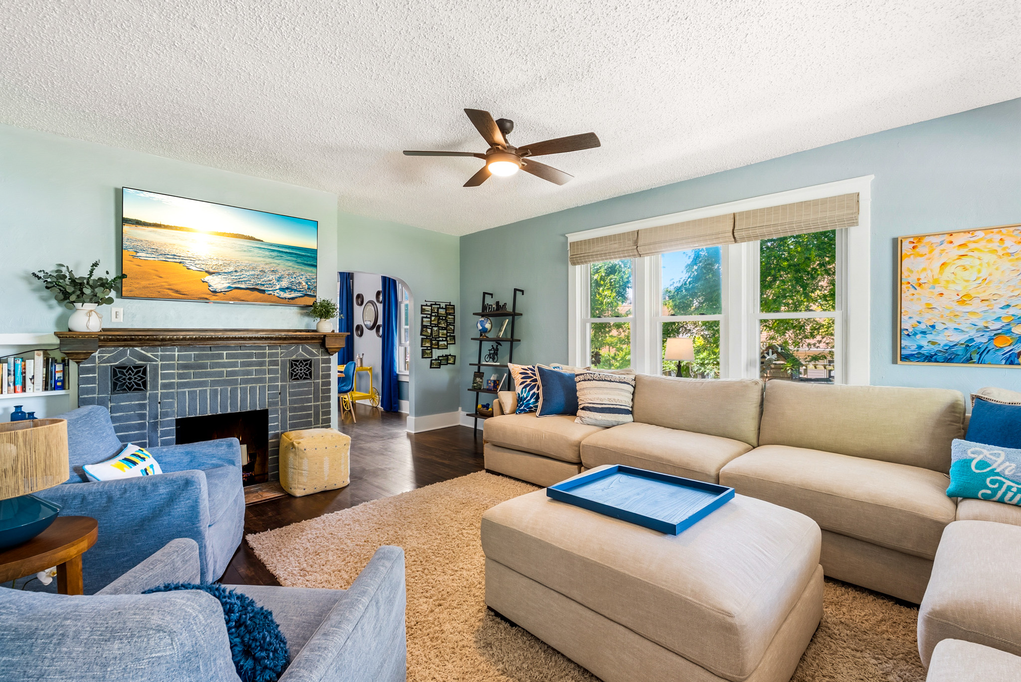 Catch the big game or stream your favorite shows on the large Roku Smart TV, surrounded by cozy seating and historic architectural details.