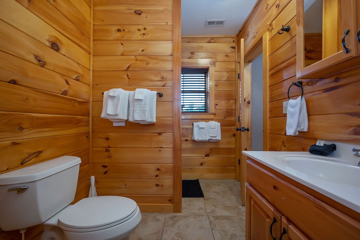 Primary bedroom with private full bathroom