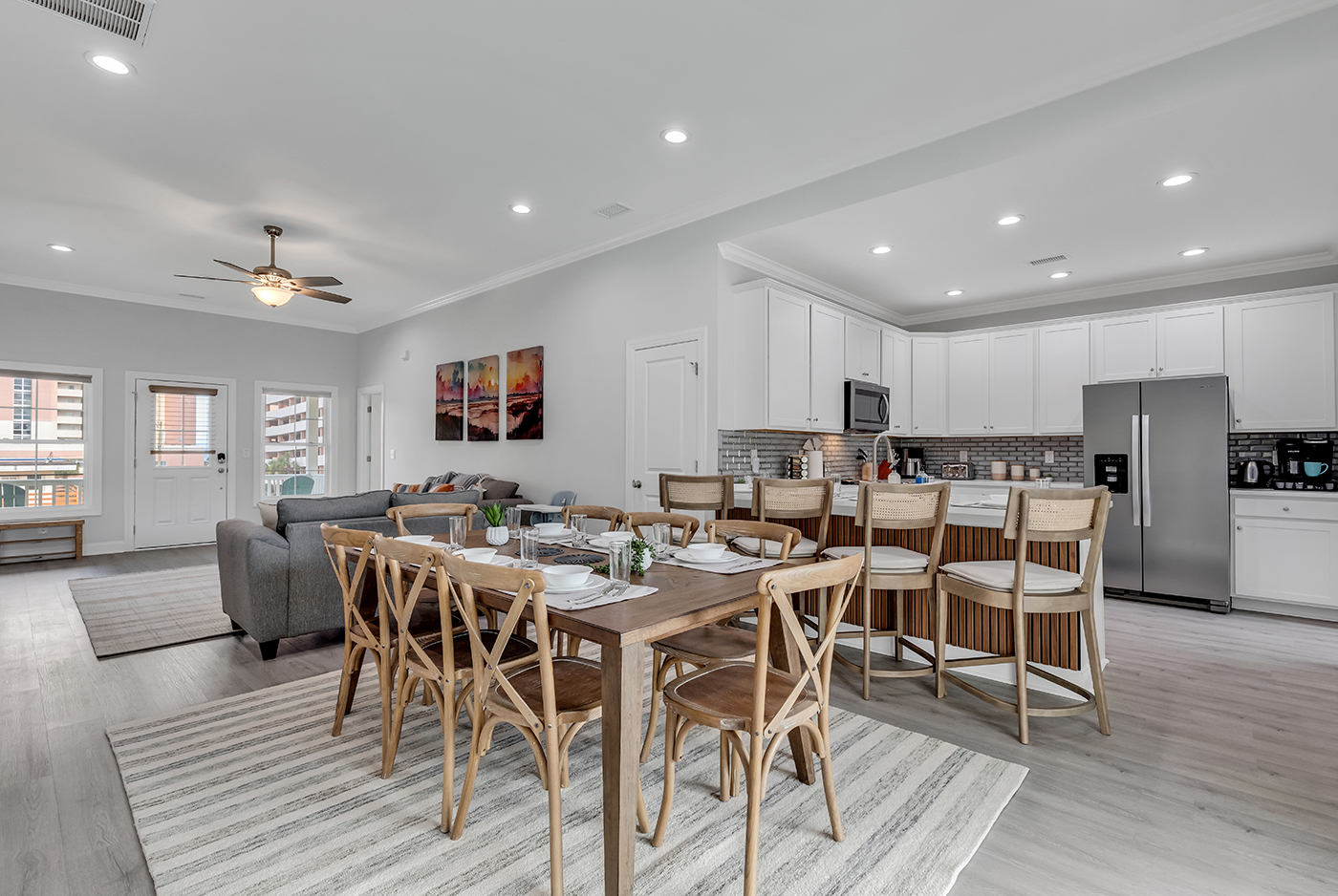 With a generously sized dining table seating 8 and additional seating for 4 at the island, there's room for everyone to come together. Enjoy shared meals and conversations in this welcoming sp