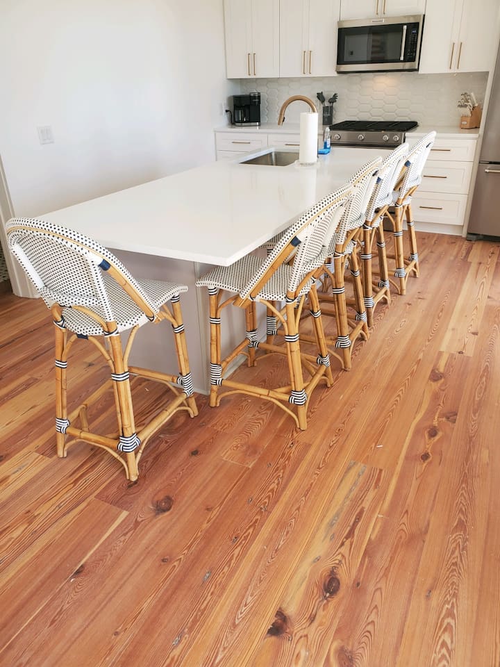 Kitchen with large island that sits 5. 