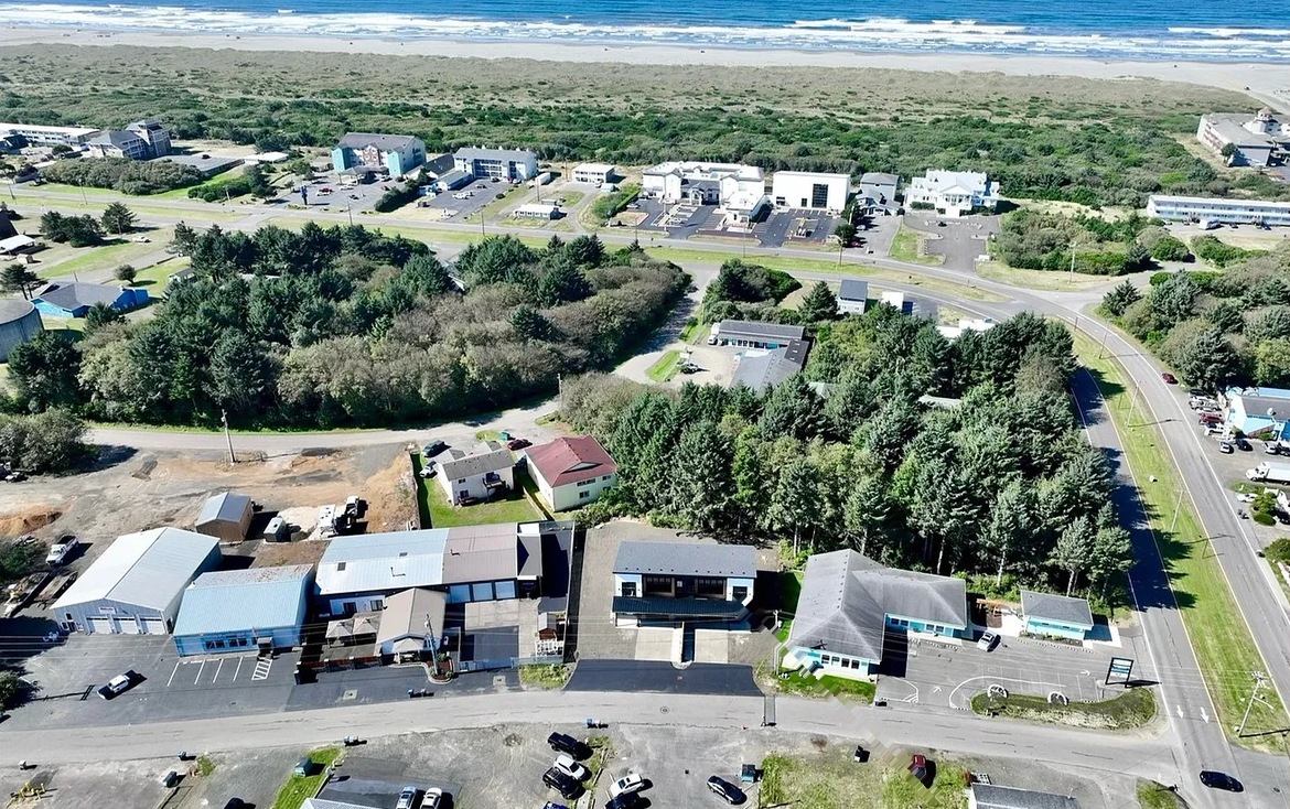 See exactly how close you really are — the ocean's right there past the rooftops, and downtown Ocean Shores is basically your backyard.