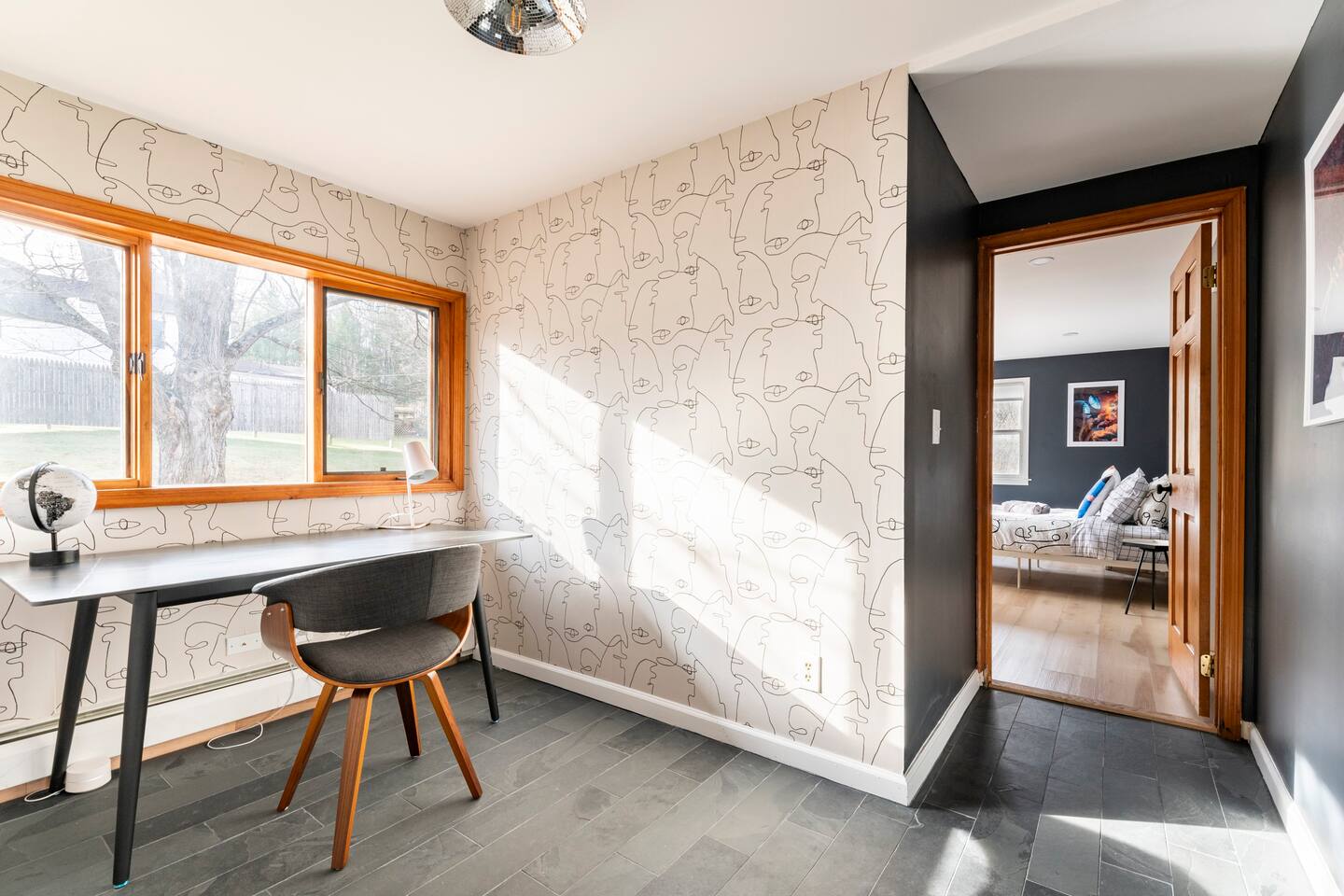 Small office in hallway. Bedroom on the right is the master bedroom with an en suite bathroom.