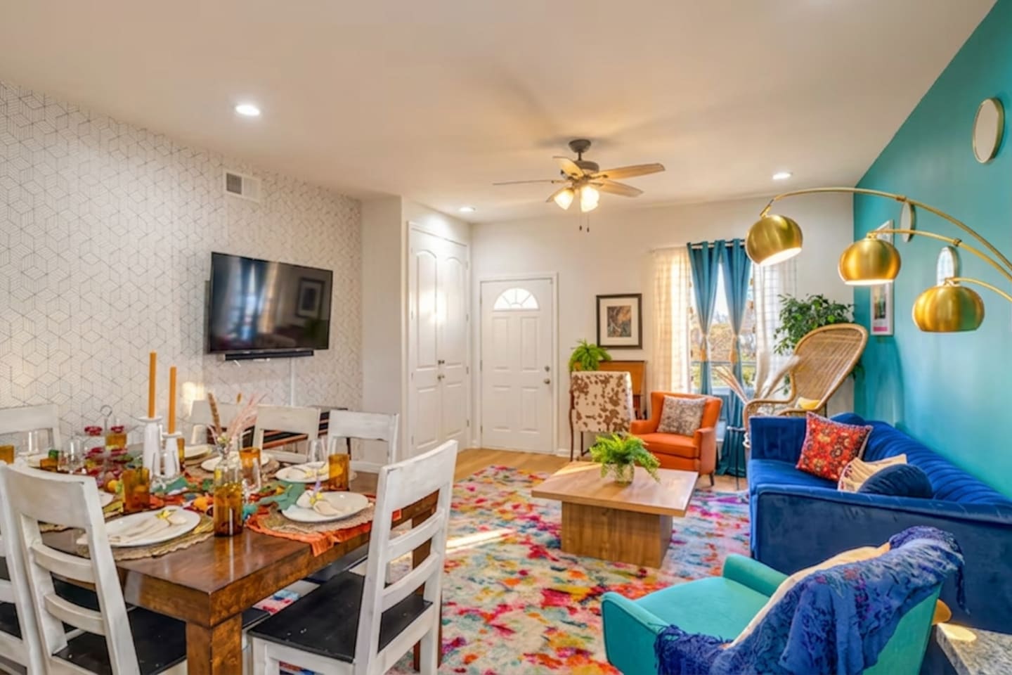 The downstairs living room is perfect for a cozy movie night or a lively group meal.  55-inch Roku TV and sound bar. 
