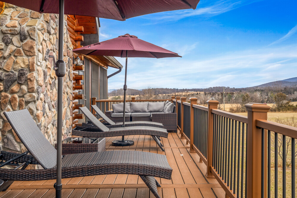 Unwind on the expansive deck at dusk, where mountain views, moonlit skies, and cozy loungers invite you to soak in the magic.