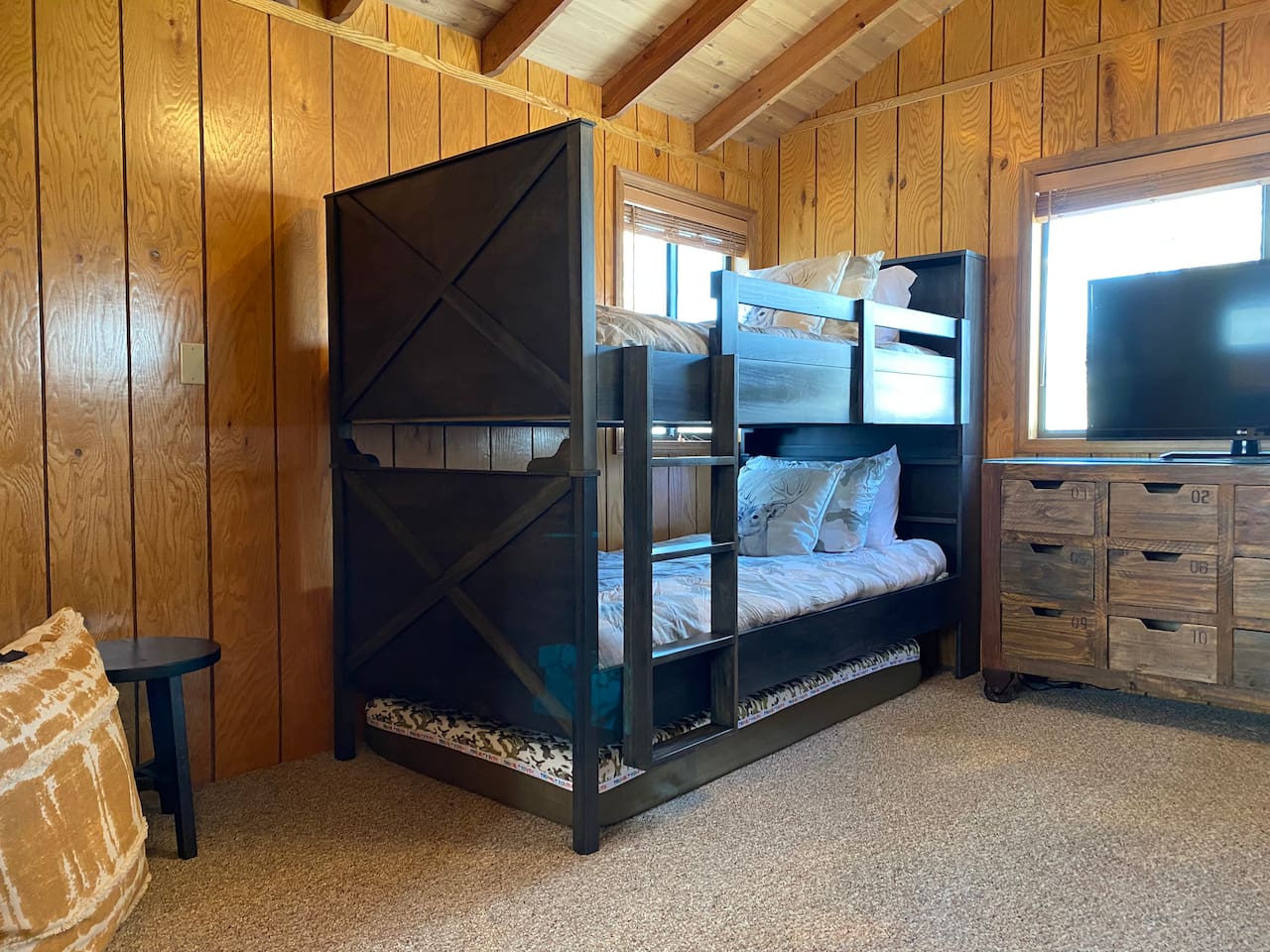 Two bunk beds with an extra 3rd mattress underneath that can be pulled out for kids