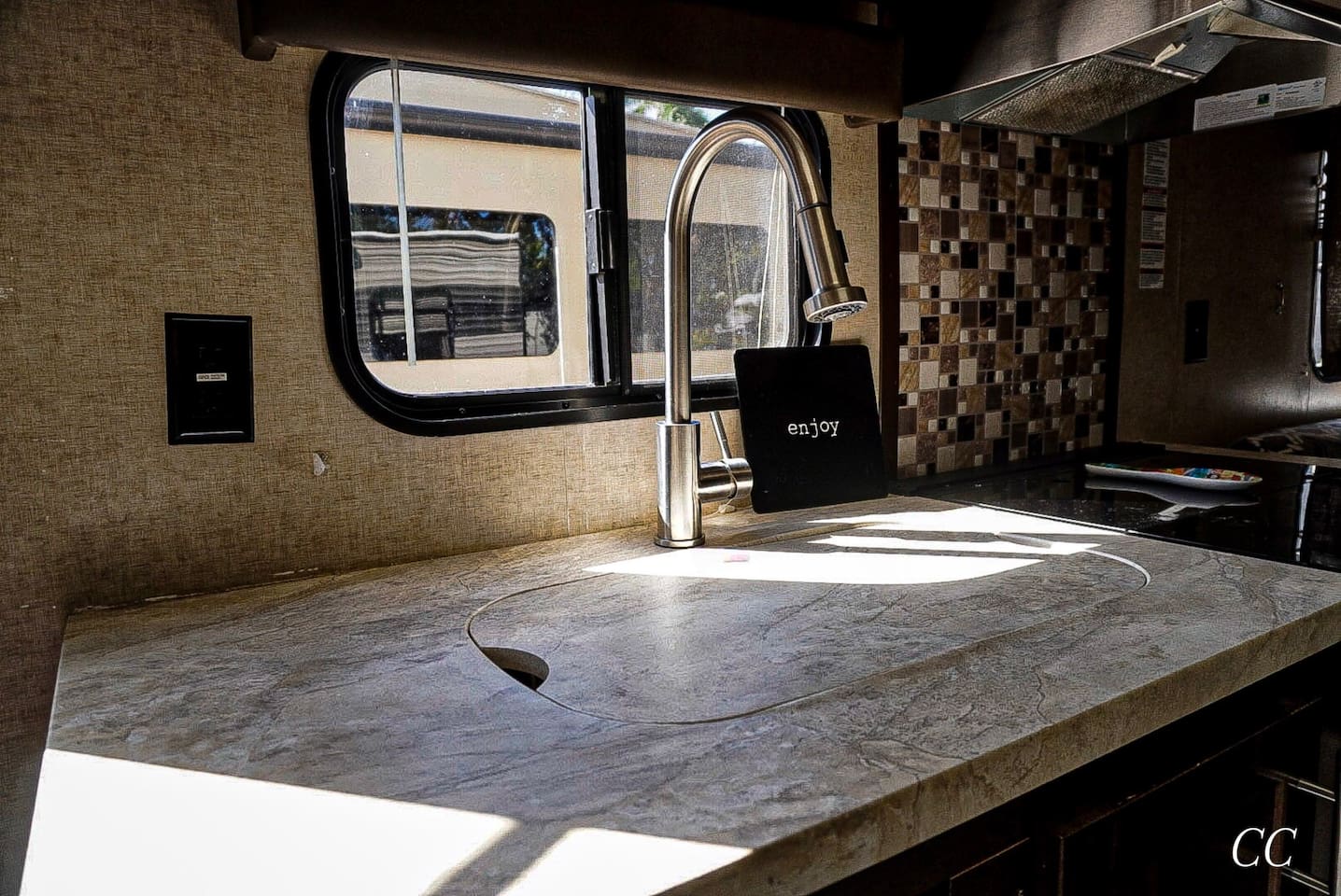 Kitchen sink with window.