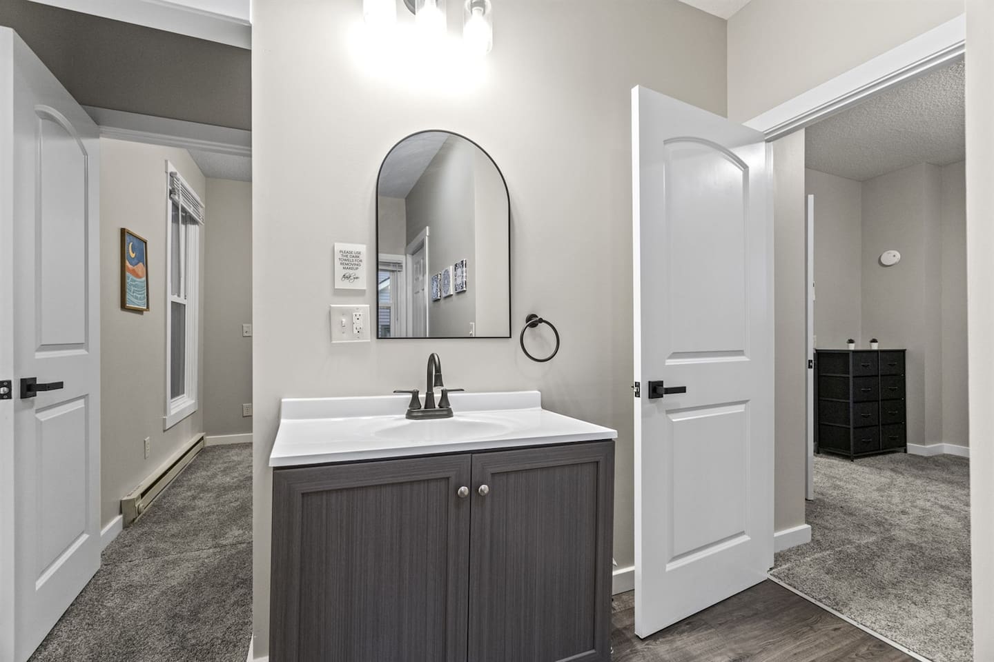 Newly designed bathroom in a Jack-and-Jill layout, conveniently accessible from both bedrooms.