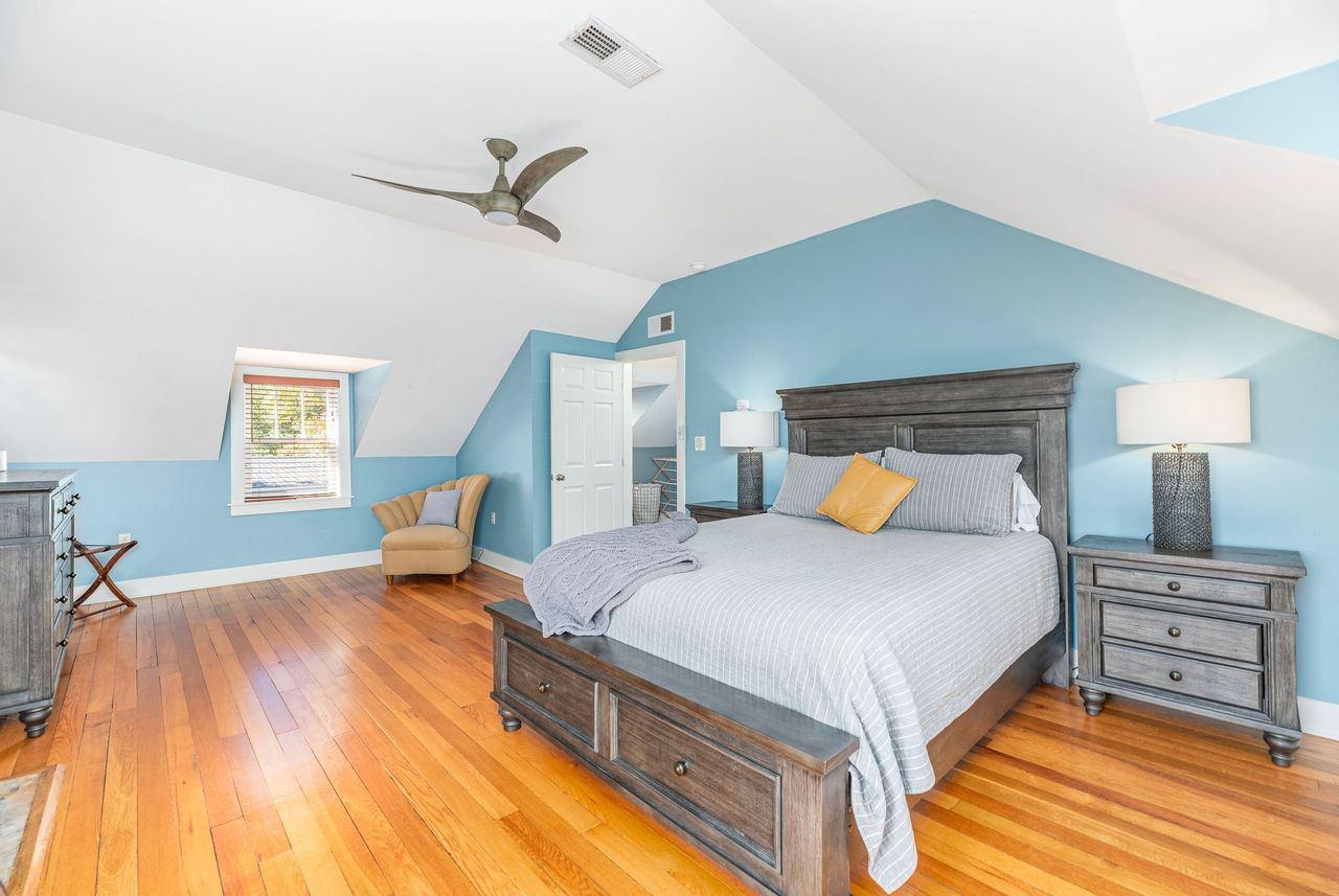 Large upstairs bedroom with comfy queen bed