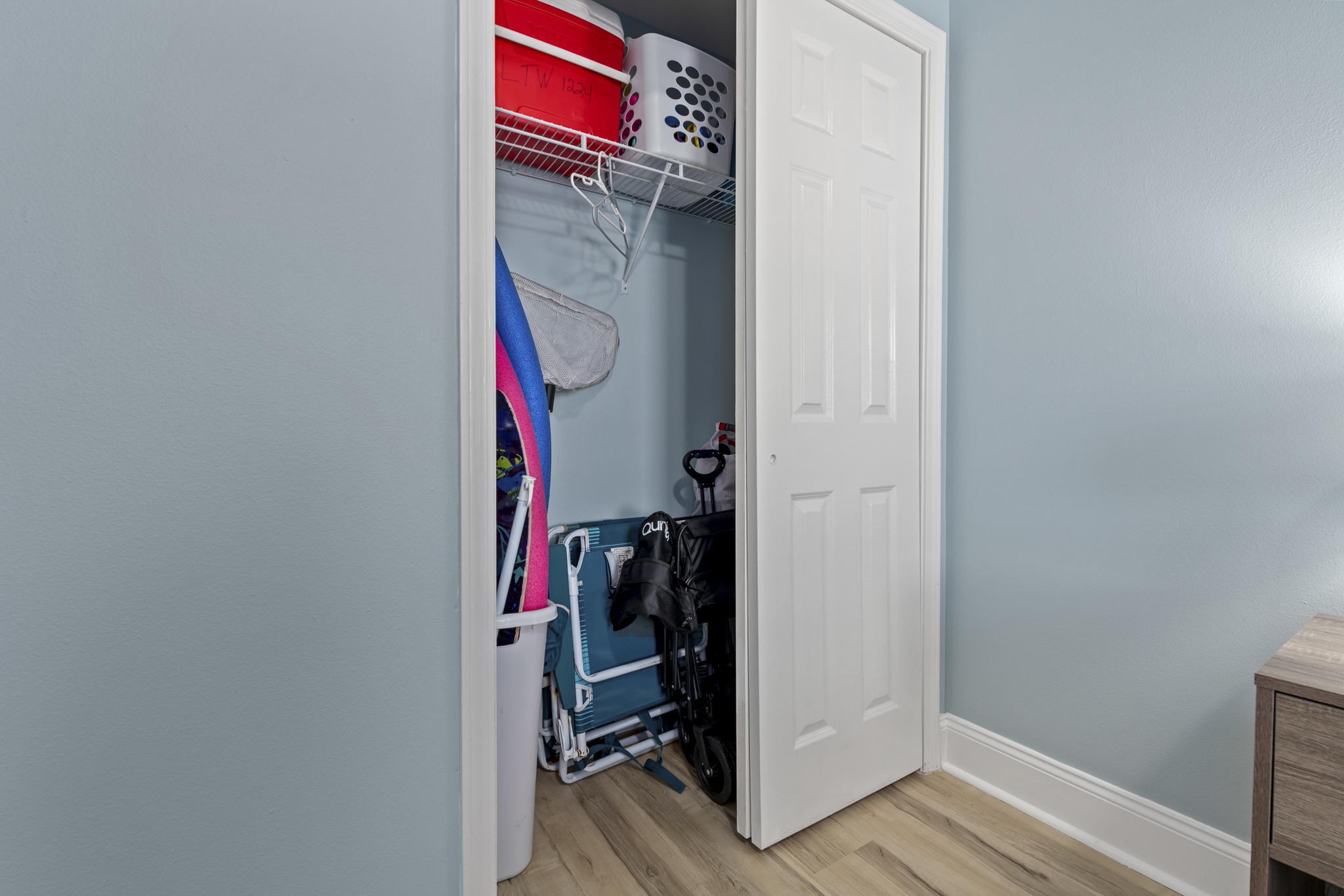 Guest closet where we store beach wagon, beach chairs and some extras for you to use.