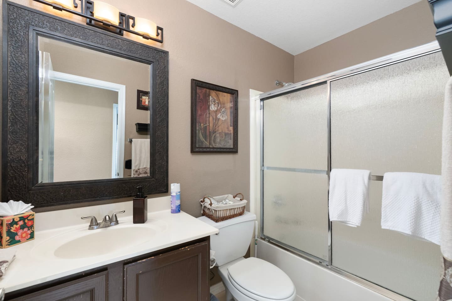The second full bathroom is clean, bright, and fully equipped with a shower/tub combo and fresh towels — everything guests need for a comfortable, fuss-free stay.