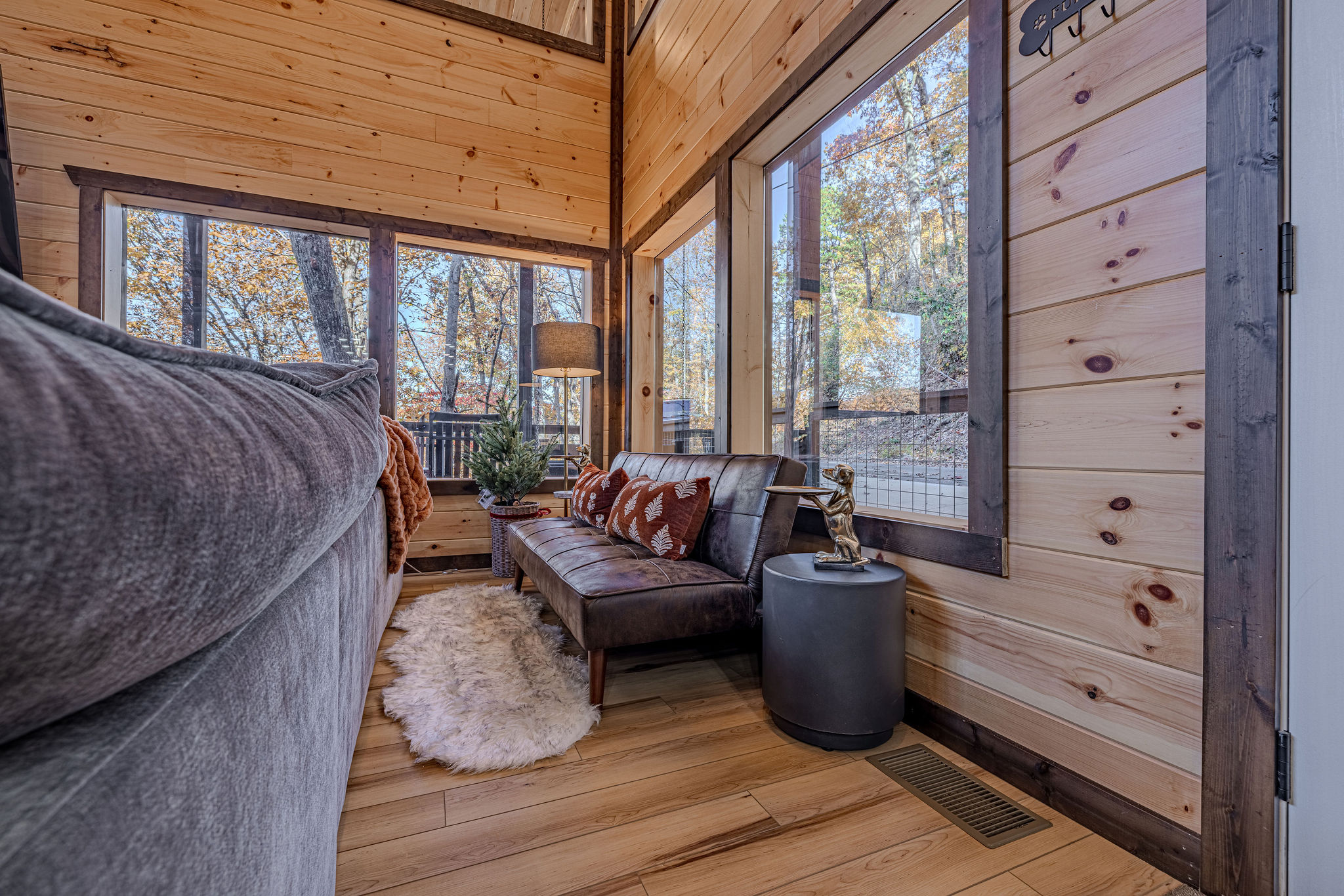 A small single bed for 1 more sleeping nook in the living room.