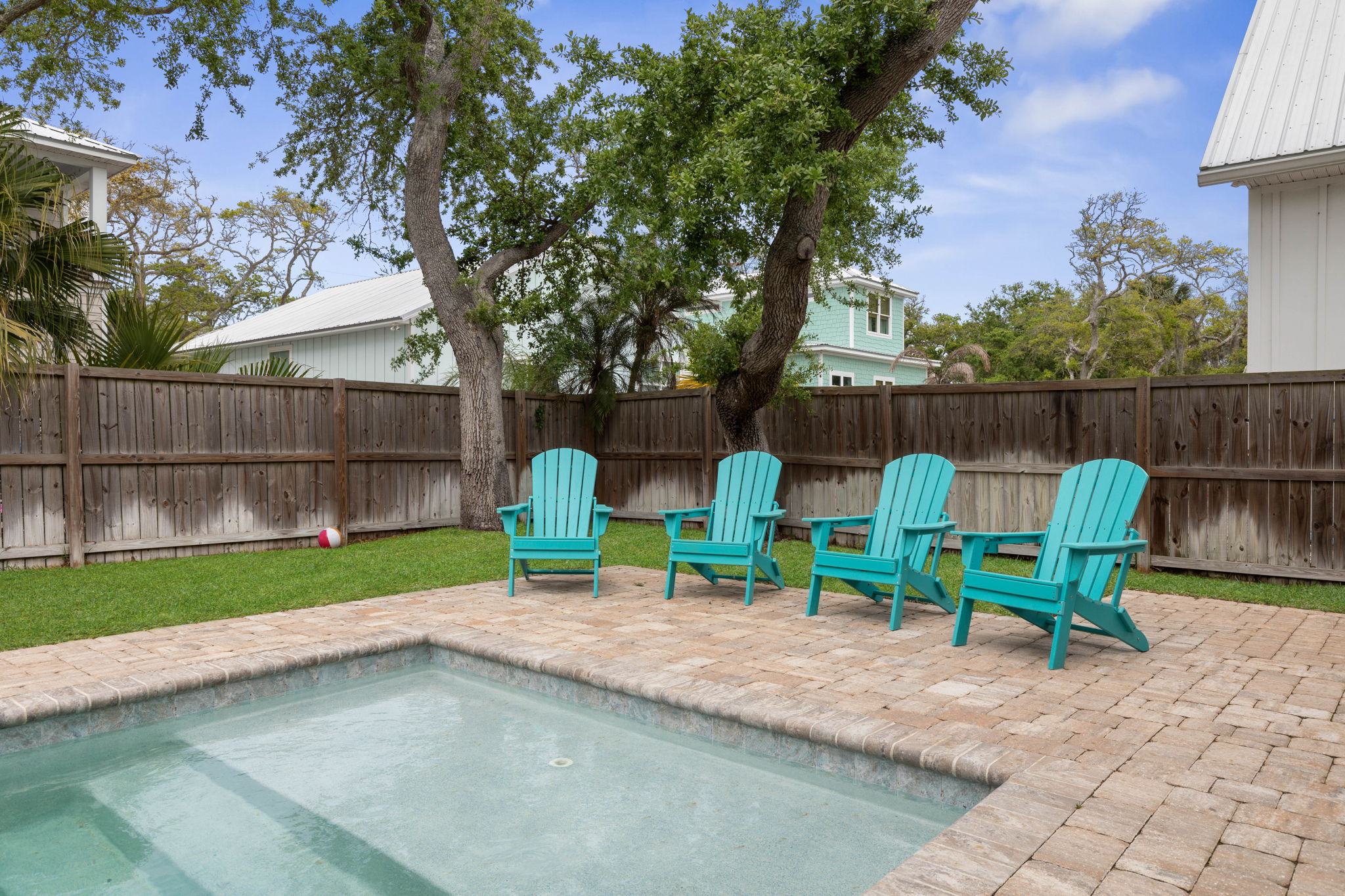 Enjoy your own private backyard pool just minutes from the beach.