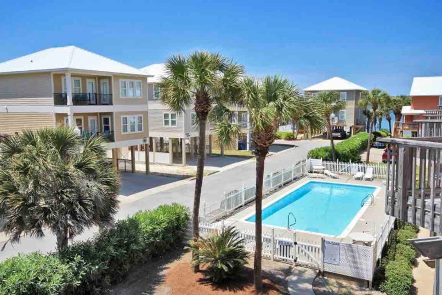Dreamy beachfront escape here at “Little Lagoon Haven” with ocean views, cozy rentals, and a refreshing pool vibe! 