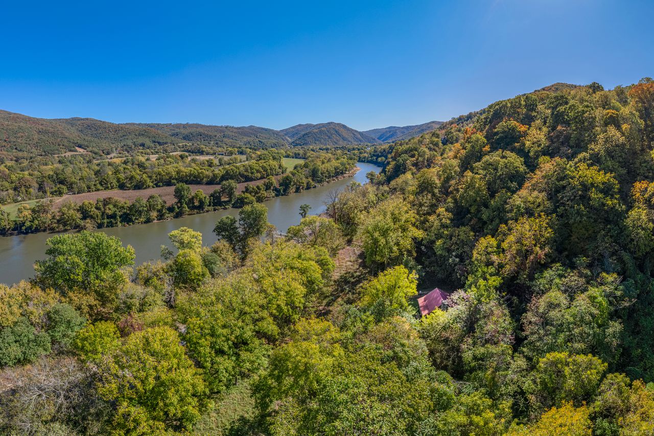 If you look closely on the right, you can see a little red roof tucked into the mountainside near the river. This picture looks towards the town of Hot Springs, NC, very close as "the crow flies." 5 minute drive. 
