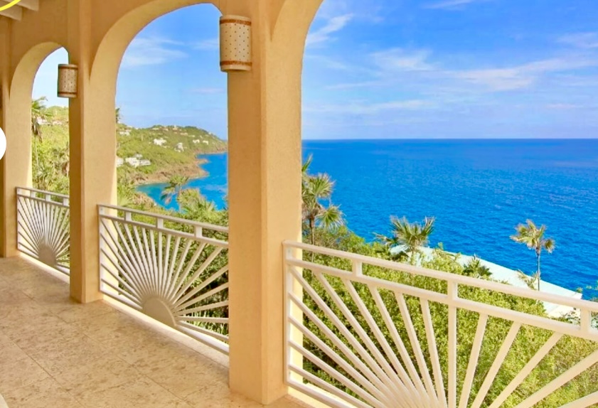 Covered oceanfront veranda with postcard Atlantic views—perfect for coffee, cocktails, and sunrise watching.