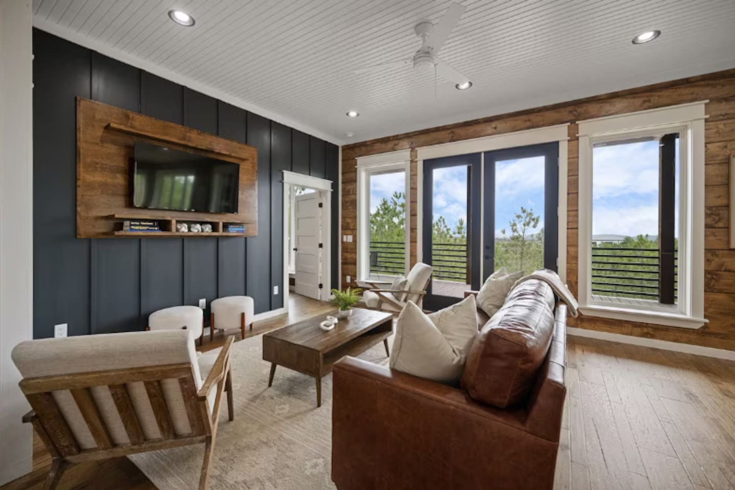 Additional living space with natural light and comfortable furnishings.