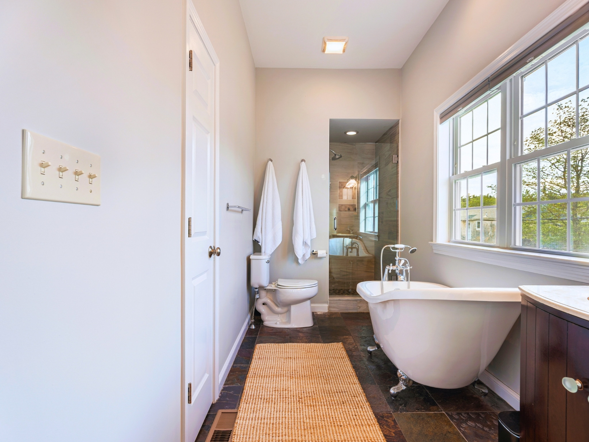 Your ensuite bathroom features a luxurious bathtub, perfect for a tranquil escape after a busy day!