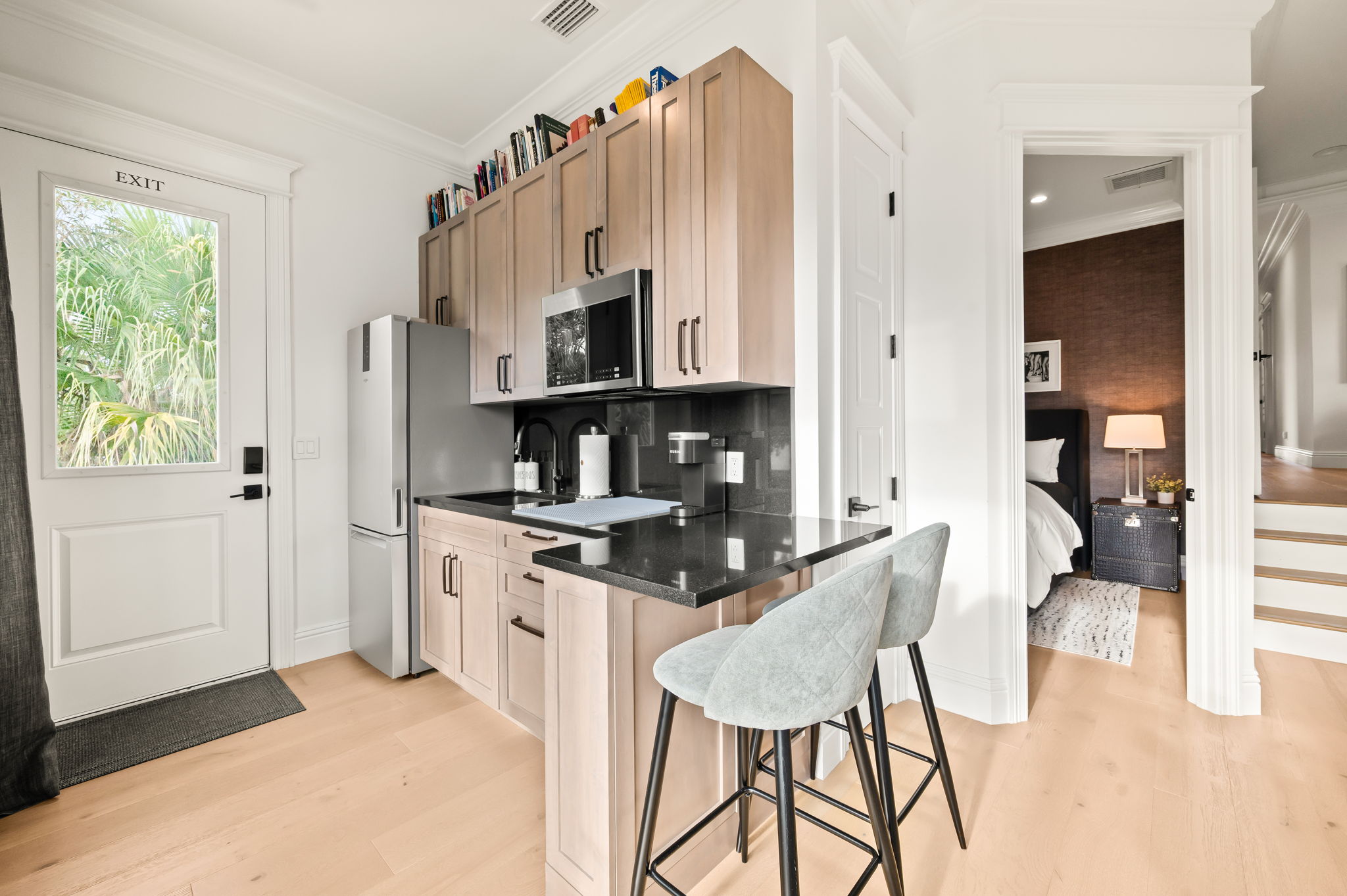 Second floor, king suite small kitchen with fridge, ice-maker, sink, toaster, Keurig  and a microwave