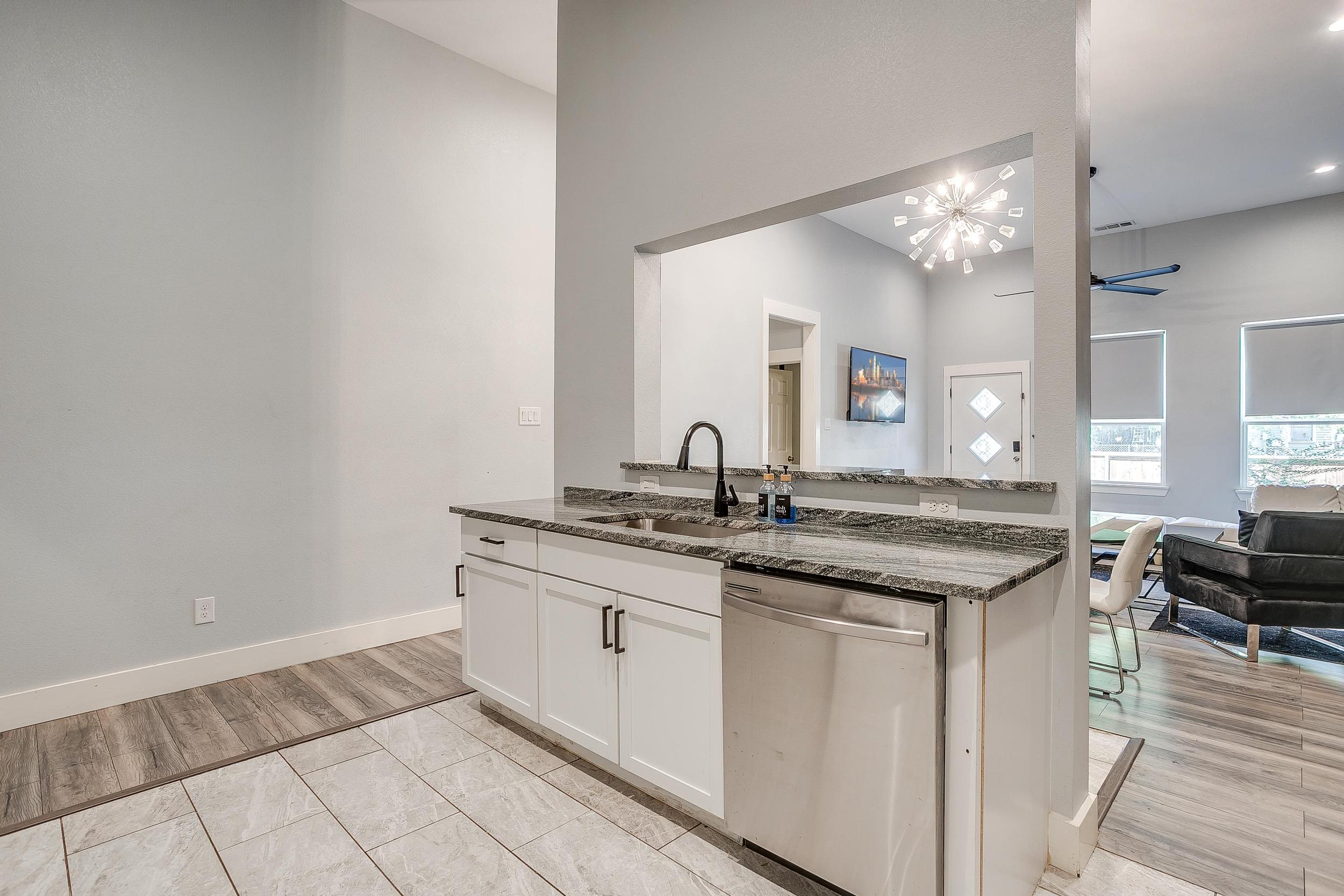 Kitchen island perfect for prepping meals or morning coffee chats.