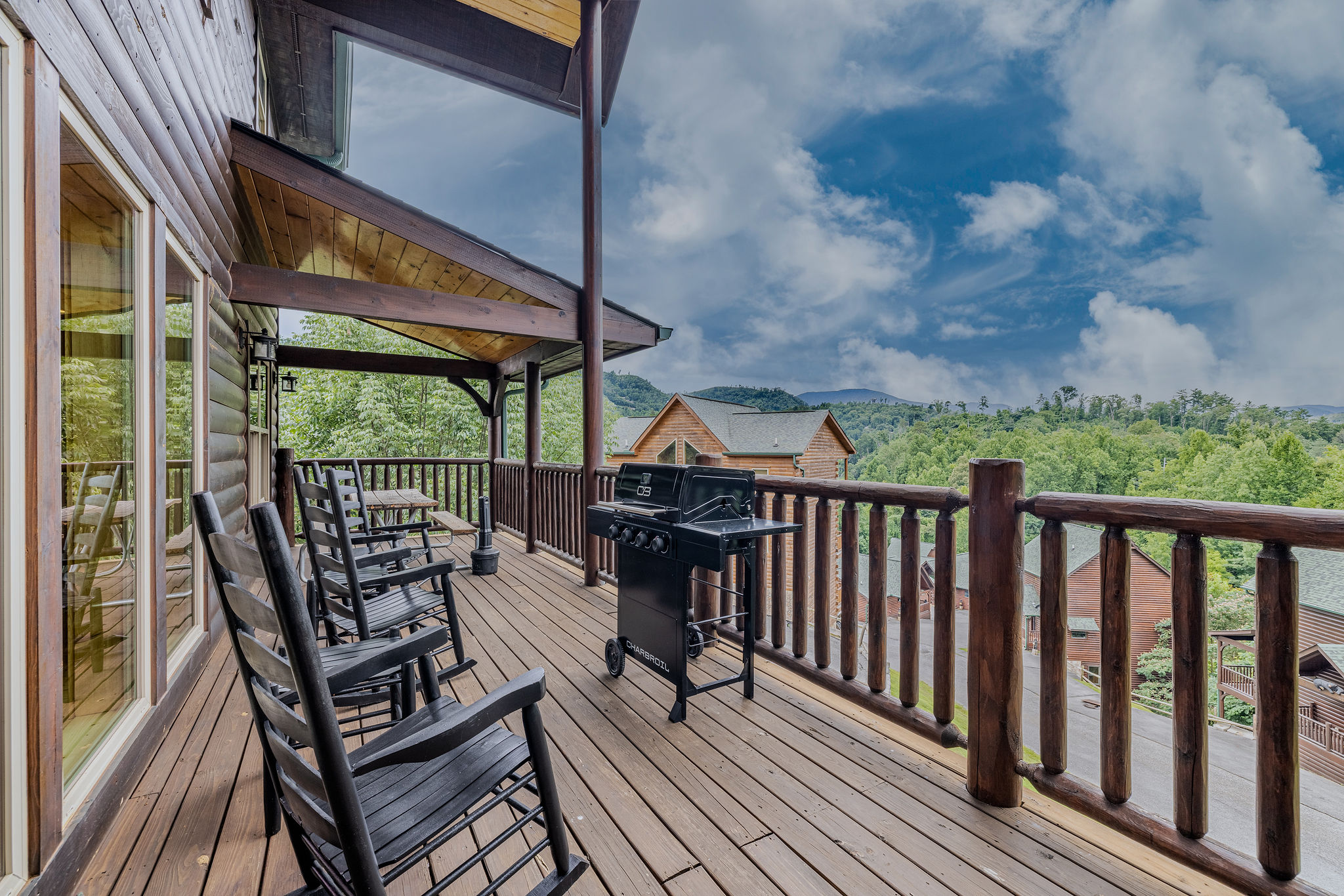 Step outside and enjoy the mountain air from one of the cabin’s spacious covered decks.