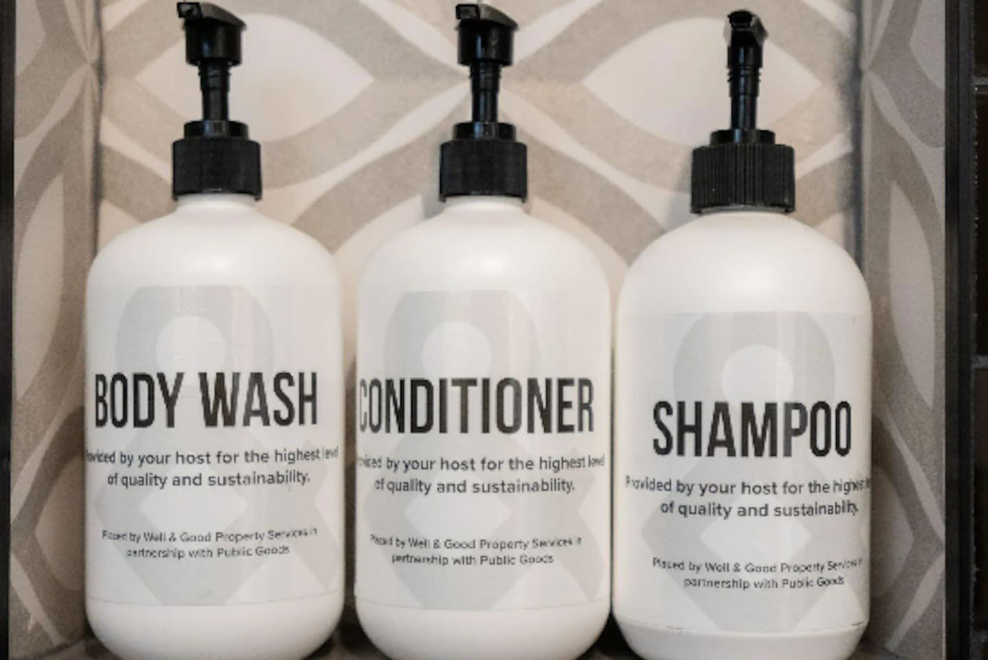 Full-size body wash, conditioner, and shampoo, stocked and ready — the small details that make a stay feel taken care of.