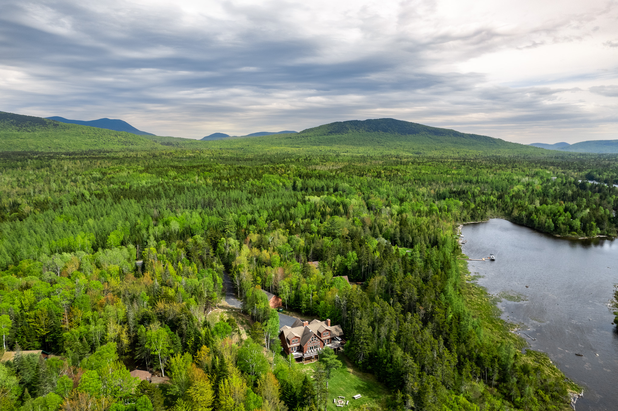 Lakefront with mountain backdrop. The best of Maine! Perfect location with restaurants, shops in Greenville as well as outdoor activities all on the same road like Lily Bay Stare Park that occupies 924 acres on the southeast shore of Moosehead Lake.