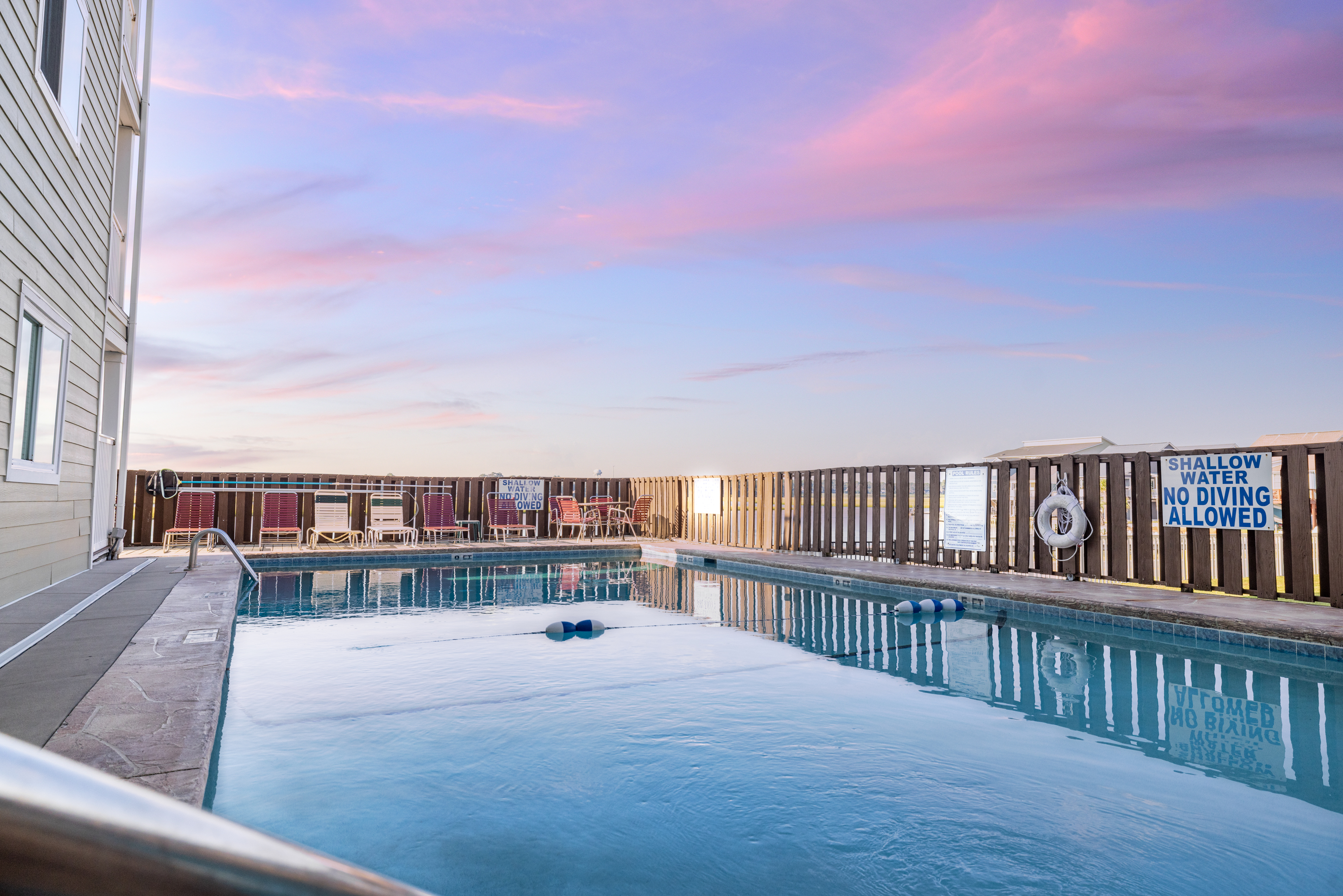 Dip into the sparkling pool that overlooks the marsh—sunset swims here feel like magic in North Myrtle Beach.