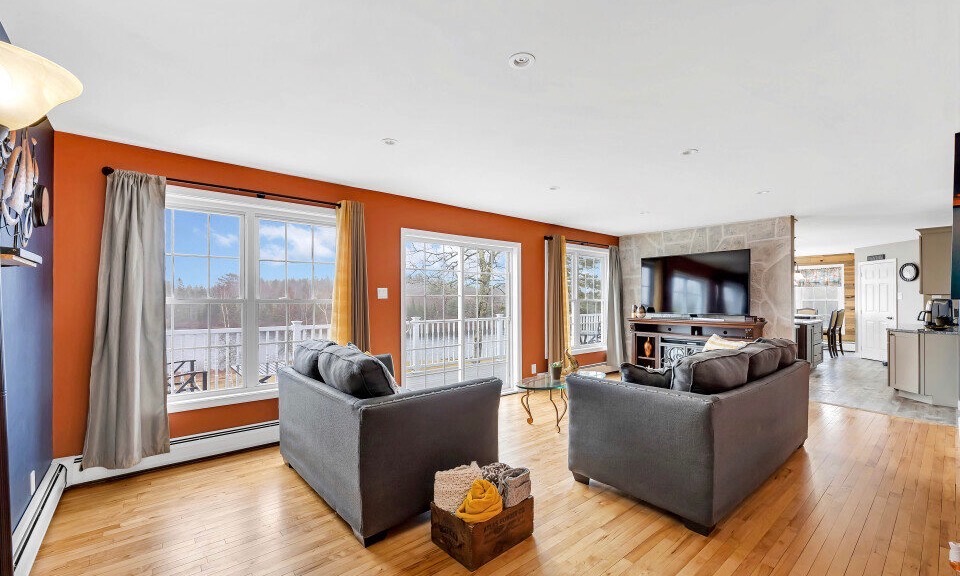 A place to gather, access the back deck, and enjoy the lake overview