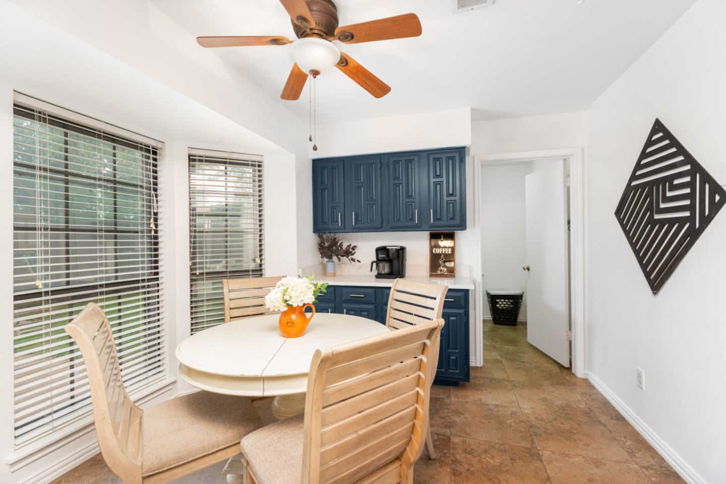 Kitchen + dining open layout with modern finishes.