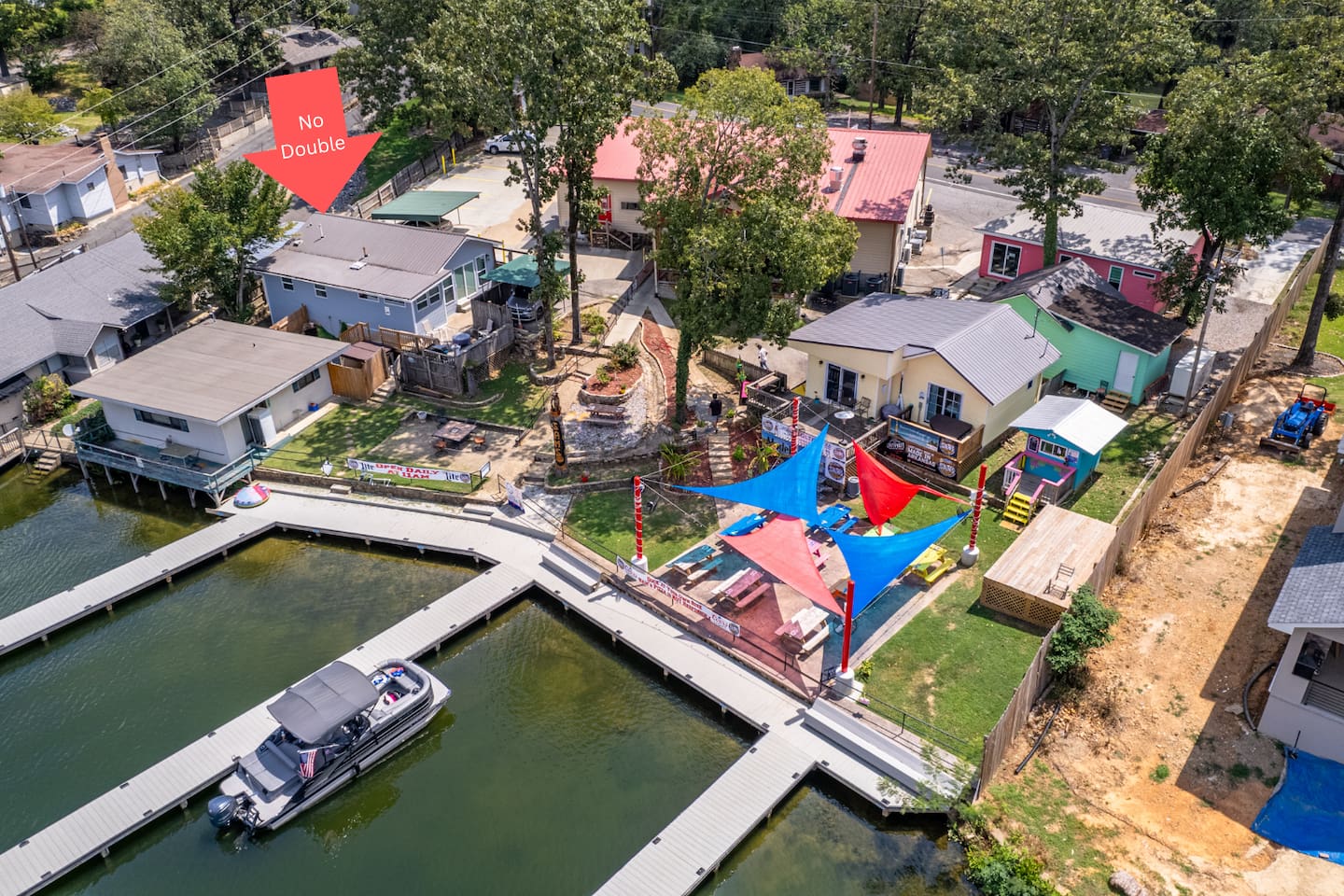 Outdoor Retreat: Relax by the water with vibrant decor and fun spaces for gatherings!