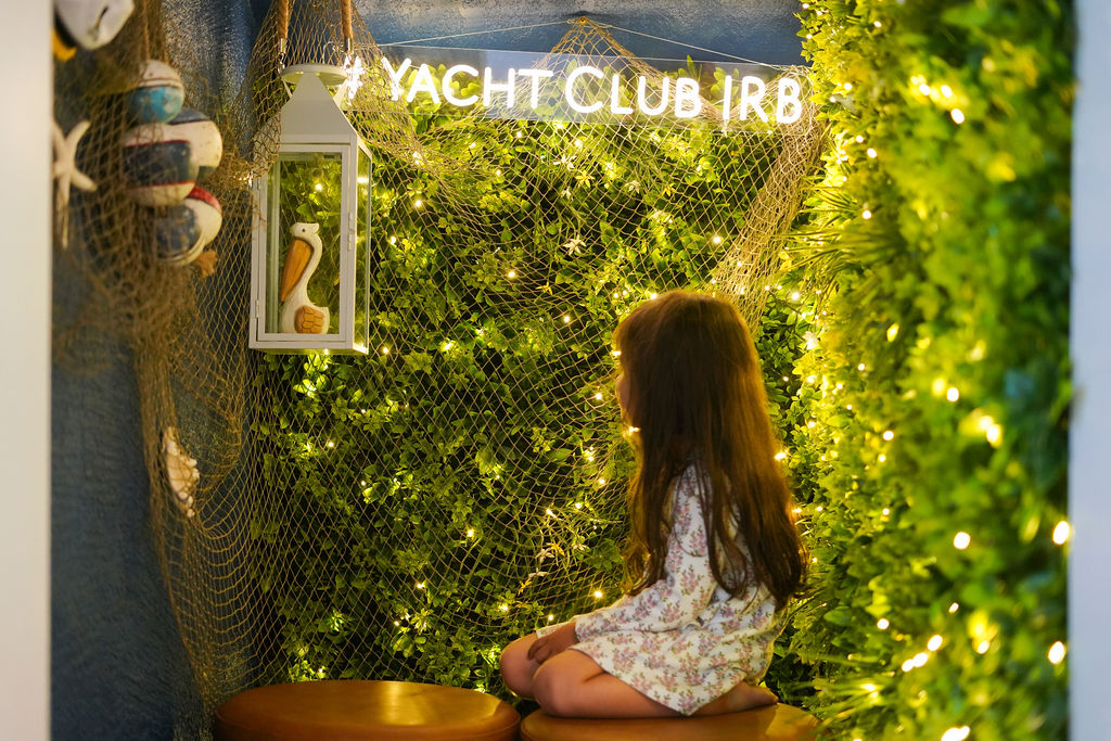 All ages love the Yacht club photo booth, making memories that last longer than the vacation
