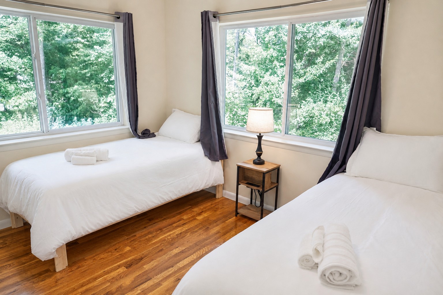Third bedroom with corner windows onto the trees