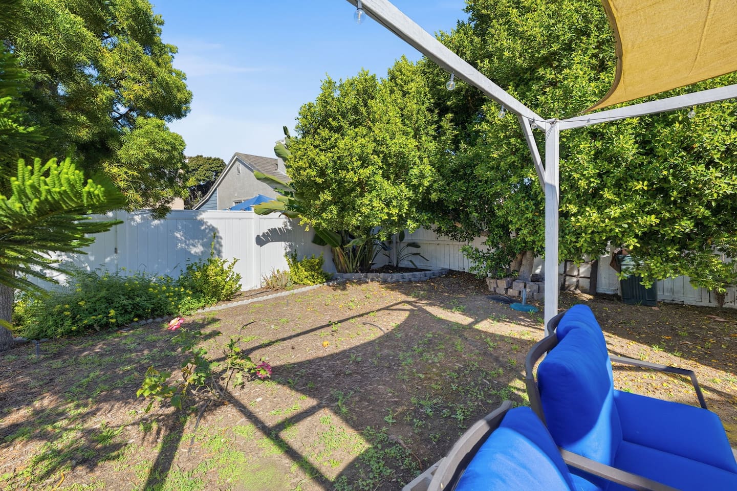 Covered patio with backyard access and BBQ grill. Great for al fresco dining after a day at Oxnard Beach.