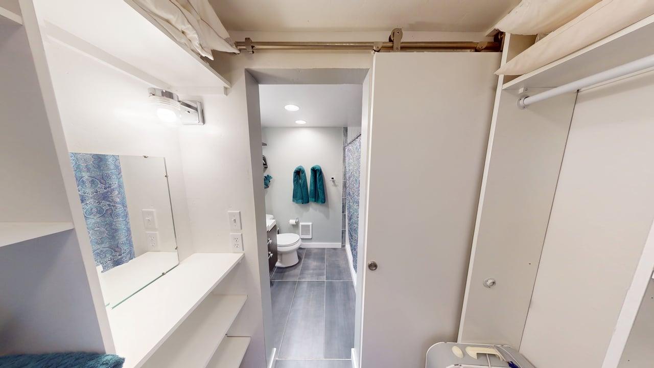 Walk-in shower en-suite bathroom with modern fixtures and comfortable amenities.