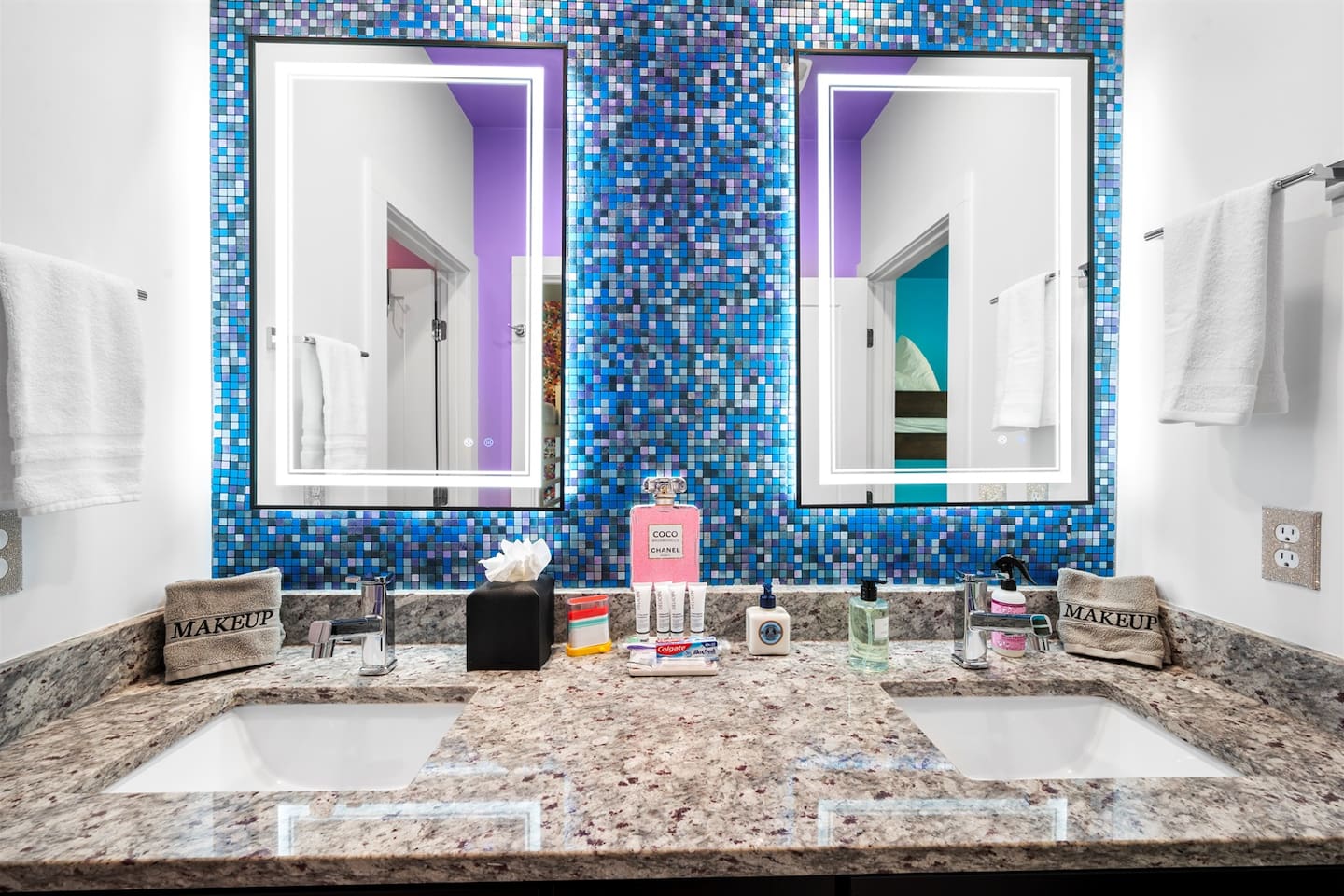 Double vanity with lighted led mirrors.