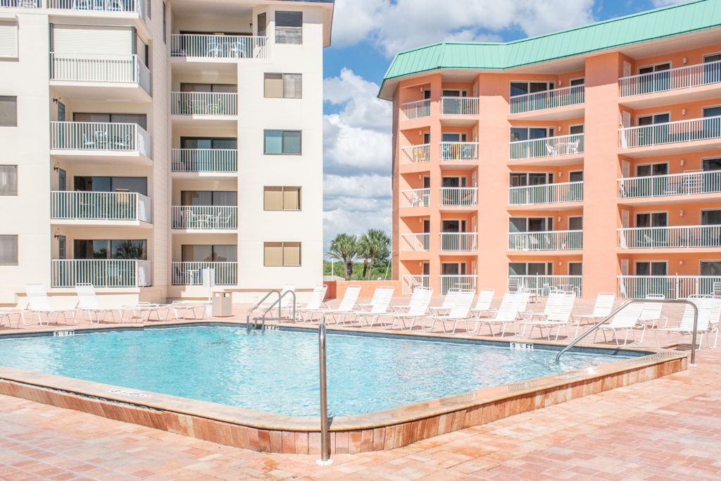 Heated Pool & Hot Tub open year round with ample seating, overlooking Gulf of Mexico.