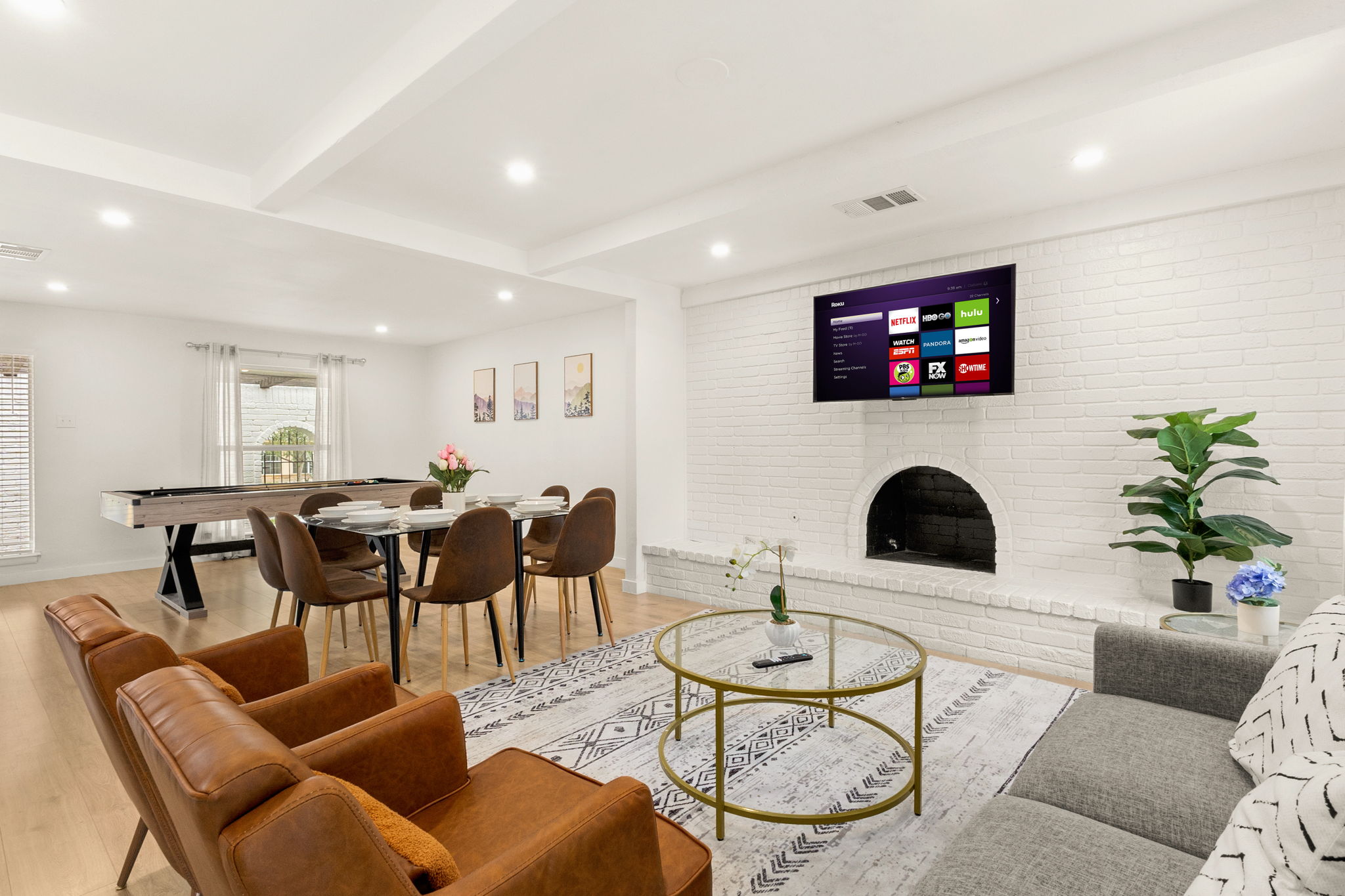 Cozy living area with fireplace & smart TV—perfect for movie nights and lounging ✨
